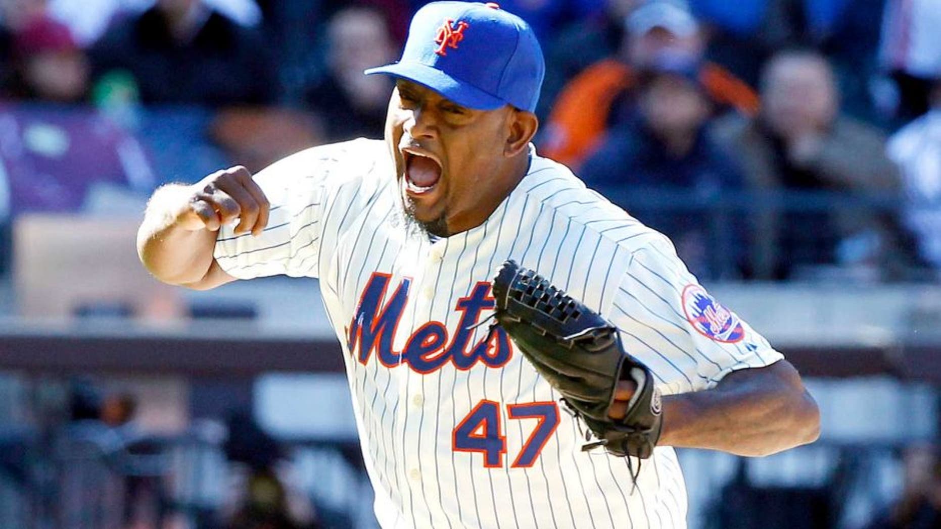 March 31, 2014; New York, NY, USA; New York Mets relief pitcher Jose Valverde (47) reacts as he strikes out Washington Nationals third baseman Ryan Zimmerman (not pictured) with the bases loaded to end the 7th inning of an opening day baseball game at Citi Field. Mandatory Credit: William Perlman/THE STAR-LEDGER via USA TODAY Sports