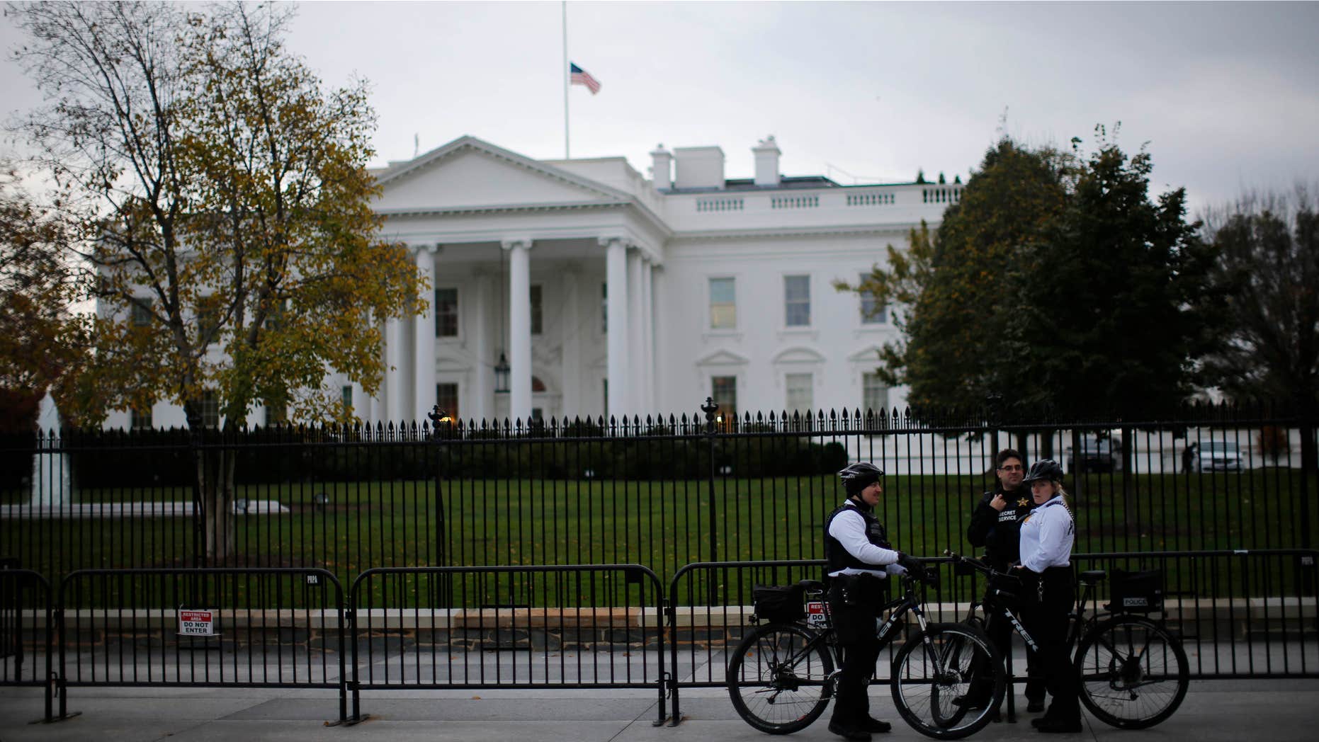 Nov. 17, 2015: Uniformed U.S. Secret Service officers keep watch outside the White House in Washington.