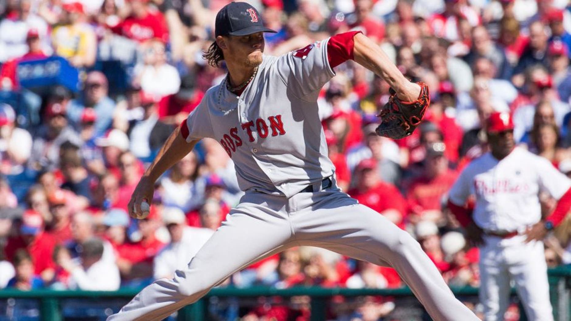 Apr 6, 2015; Philadelphia, PA, USA; Boston Red Sox starting pitcher Clay Buchholz (11) pitches against the Philadelphia Phillies during the first inning on opening day at Citizens bank Park. Mandatory Credit: Bill Streicher-USA TODAY Sports