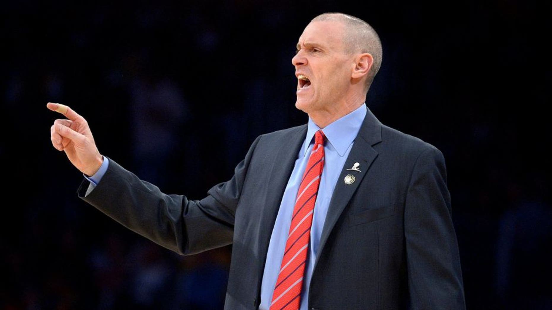 Apr 4, 2014; Los Angeles, CA, USA; Dallas Mavericks coach Rick Carlisle reacts during the first half against the Los Angeles Lakers at Staples Center. Mandatory Credit: Kirby Lee-USA TODAY Sports