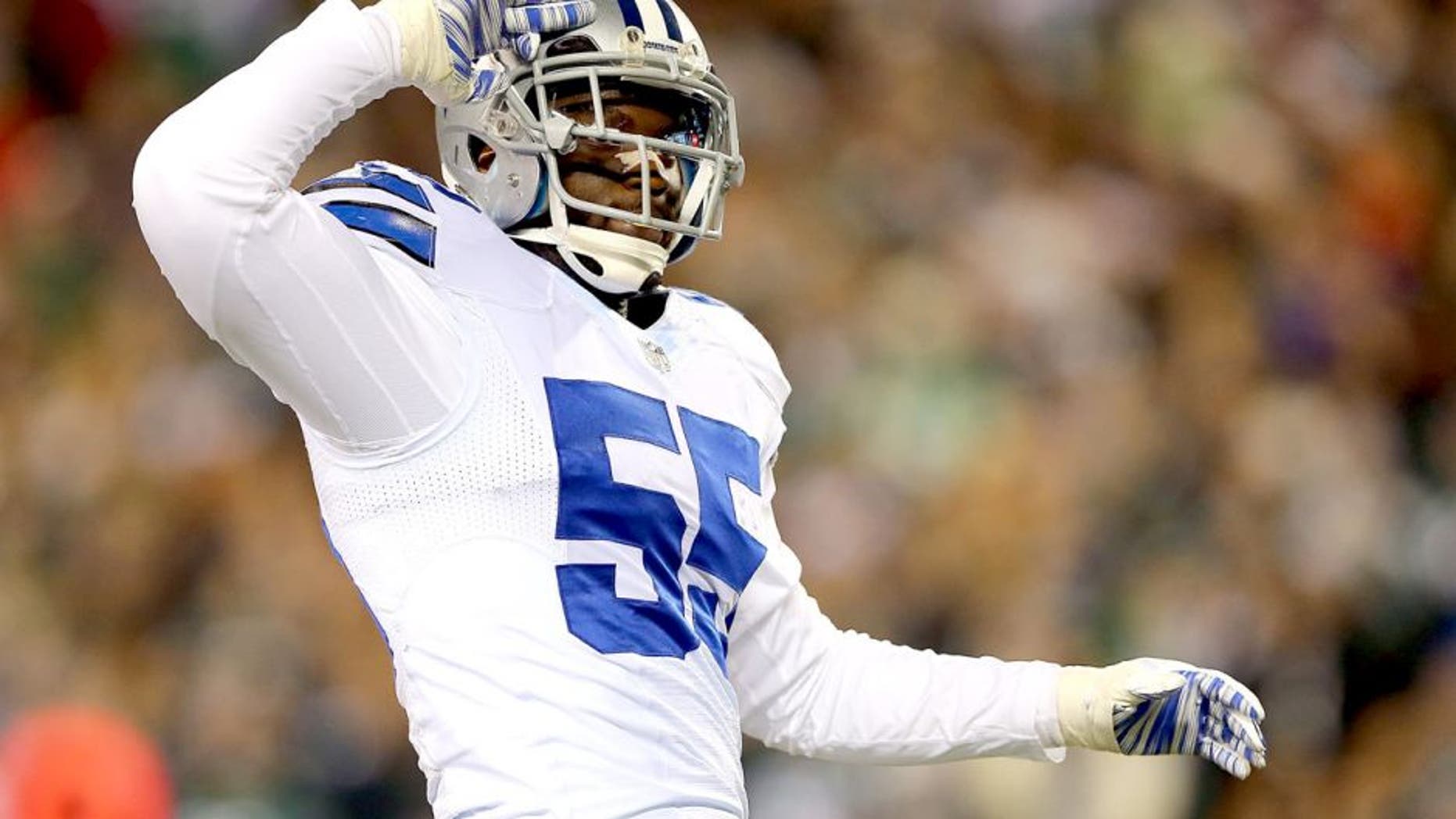 PHILADELPHIA, PA - DECEMBER 14: Rolando McClain #55 of the Dallas Cowboys reacts during the game against the Philadelphia Eagles at Lincoln Financial Field on December 14, 2014 in Philadelphia, Pennsylvania. (Photo by Elsa/Getty Images)