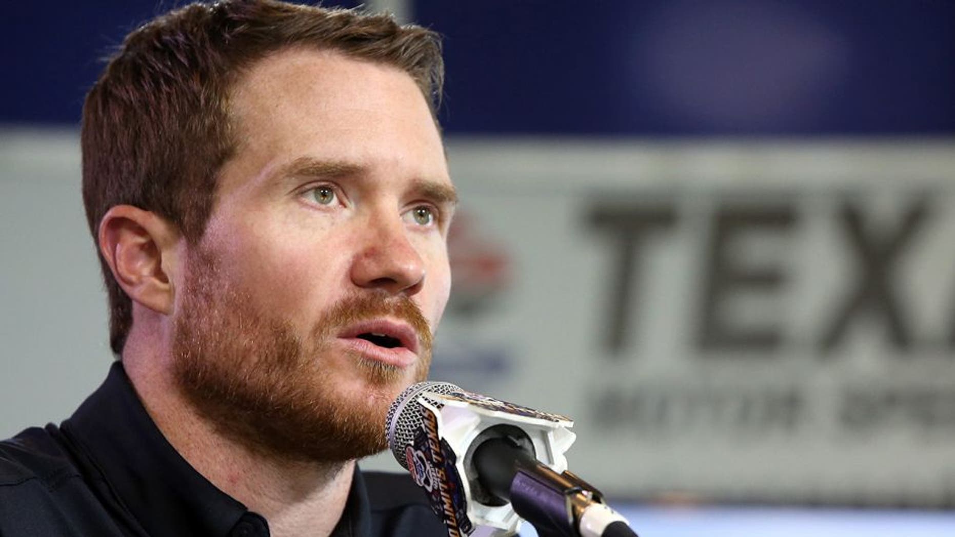 FORT WORTH, TEXAS - APRIL 07: NASCAR Sprint Cup Series driver Brian Vickers speaks during a press conference as Stewart-Haas Racing unveils the No. 14 TaxAct Military Files Free Chevrolet that Vickers will race in the Duck Commander 500 on Saturday night at Texas Motor Speedway on April 7, 2016 in Fort Worth, Texas. (Photo by Sean Gardner/Stewart-Haas Racing via Getty Images)