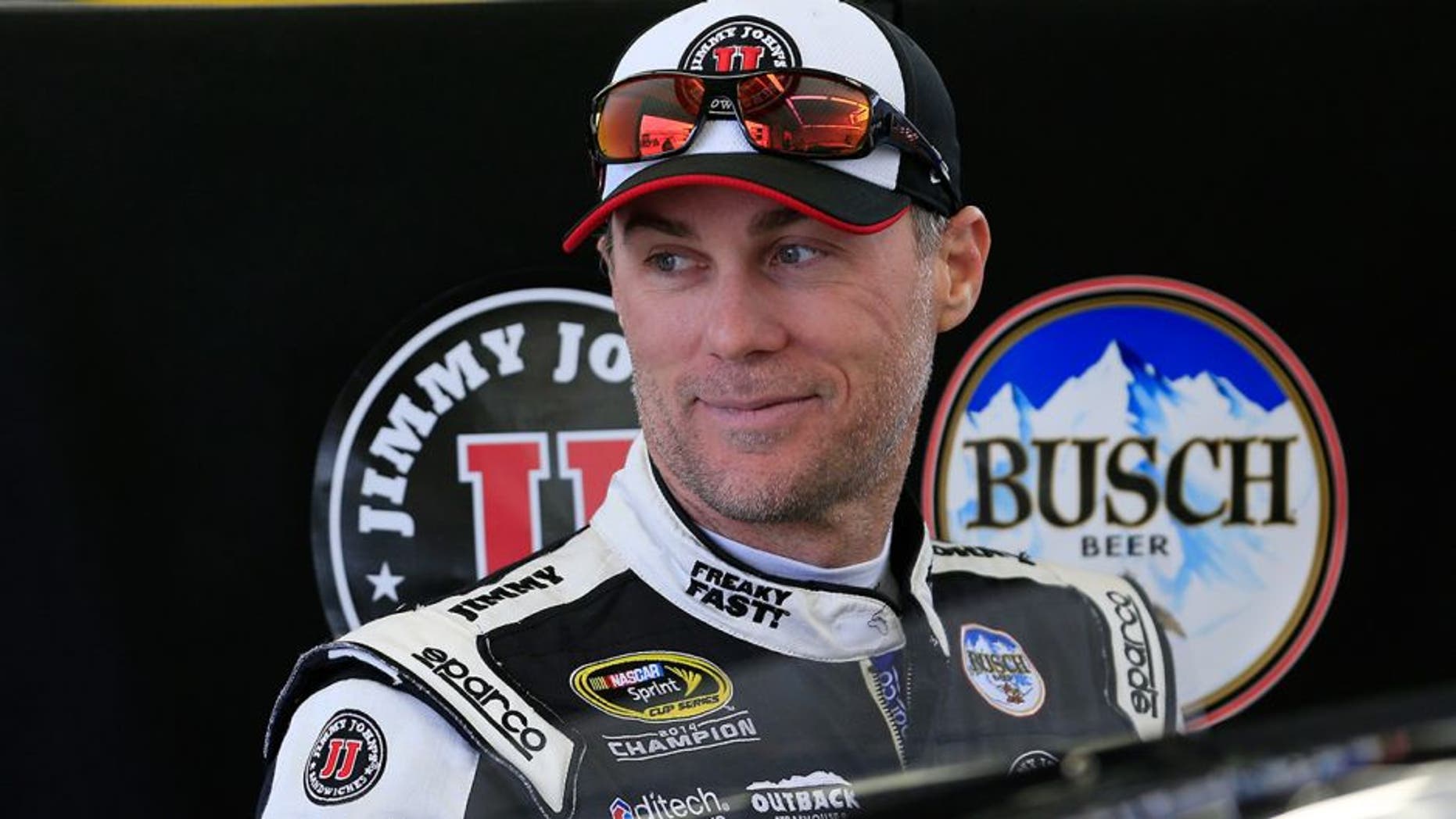 LAS VEGAS, NV - MARCH 05: Kevin Harvick, driver of the #4 Jimmy John's Chevrolet, stands next to his car in the garage area during practice for the NASCAR Sprint Cup Series Kobalt 400 at Las Vegas Motor Speedway on March 5, 2016 in Las Vegas, Nevada. (Photo by Chris Trotman/Getty Images)