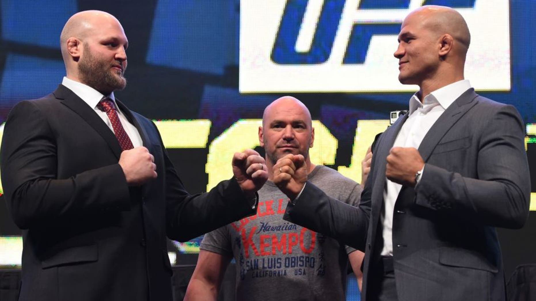 LAS VEGAS, NV - MARCH 04: (L-R) Opponents Ben Rothwell and Junior dos Santos face off during the UFC Unstoppable launch press conference at the MGM Grand Garden Arena on March 4, 2016 in Las Vegas, Nevada. (Photo by Josh Hedges/Zuffa LLC/Zuffa LLC via Getty Images)
