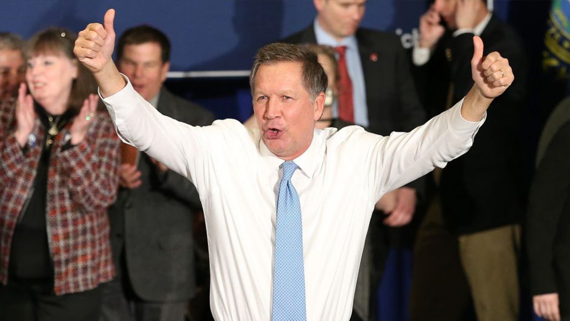 Republican presidential candidate Ohio Governor John Kasich waves to the crowd after speaking at a campaign gathering with supporters upon placing second place in the New Hampshire republican primary on February 9, 2016 in Concord, New Hampshire. Kasich lost the Republican primary to Donald Trump, though he upset fellow Republican governors Chris Christie and former Governor Jeb Bush. (Photo by Andrew Burton/Getty Images)