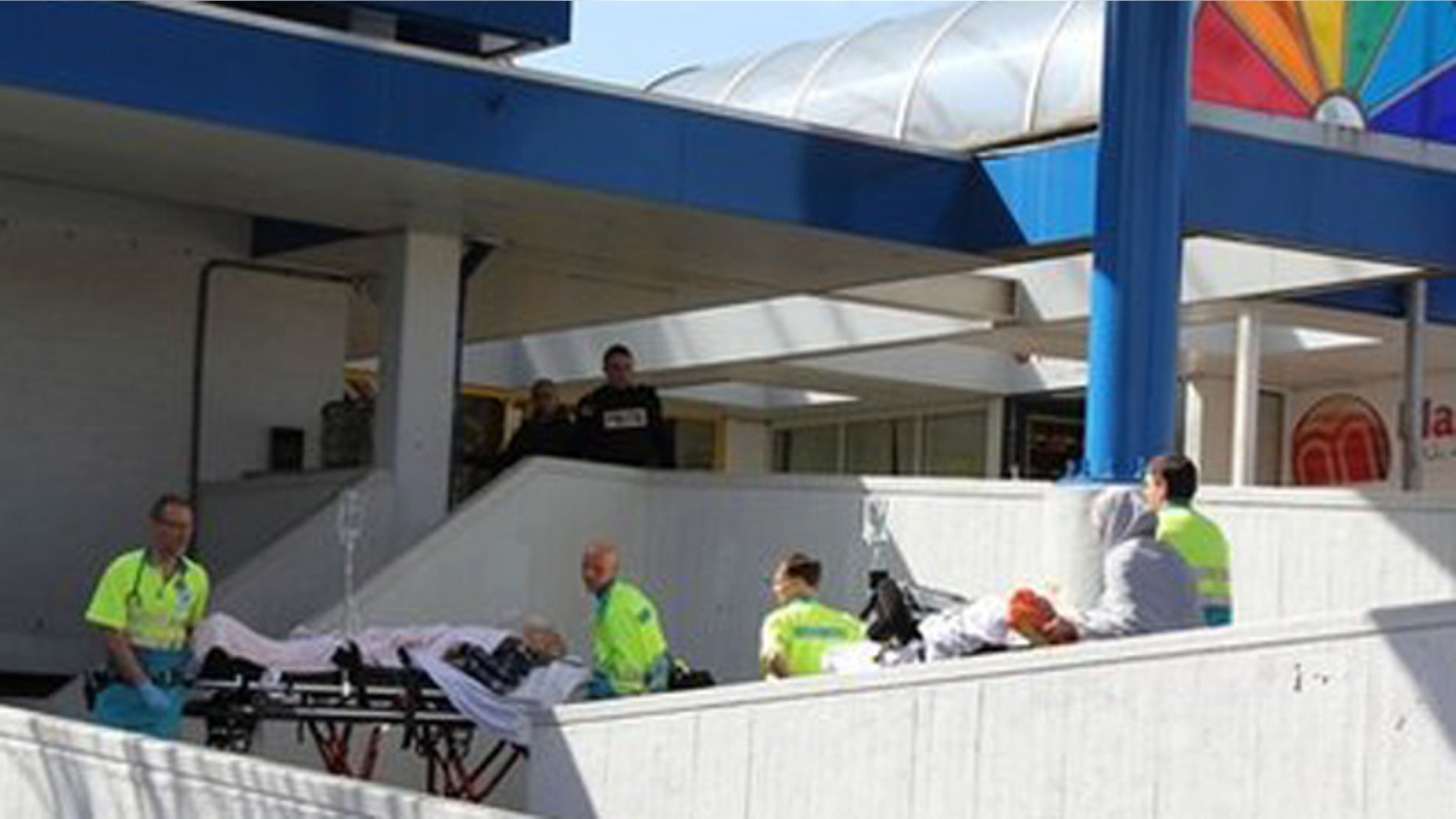 April 9: Injured people are carried out of a shopping mall after a shooting in Alpen aan den Rijn, Netherlands.