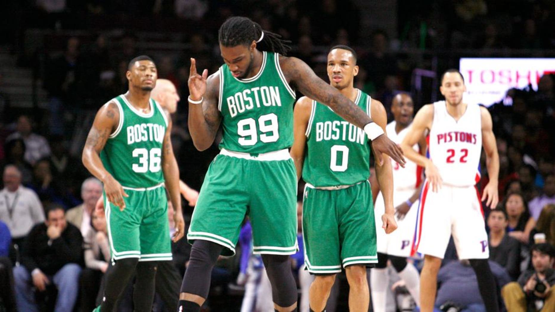 Apr 8, 2015; Auburn Hills, MI, USA; Boston Celtics forward Jae Crowder (99) celebrates after scoring during the third quarter against the Detroit Pistons at The Palace of Auburn Hills. Celtics beat the Pistons 113-103. Mandatory Credit: Raj Mehta-USA TODAY Sports
