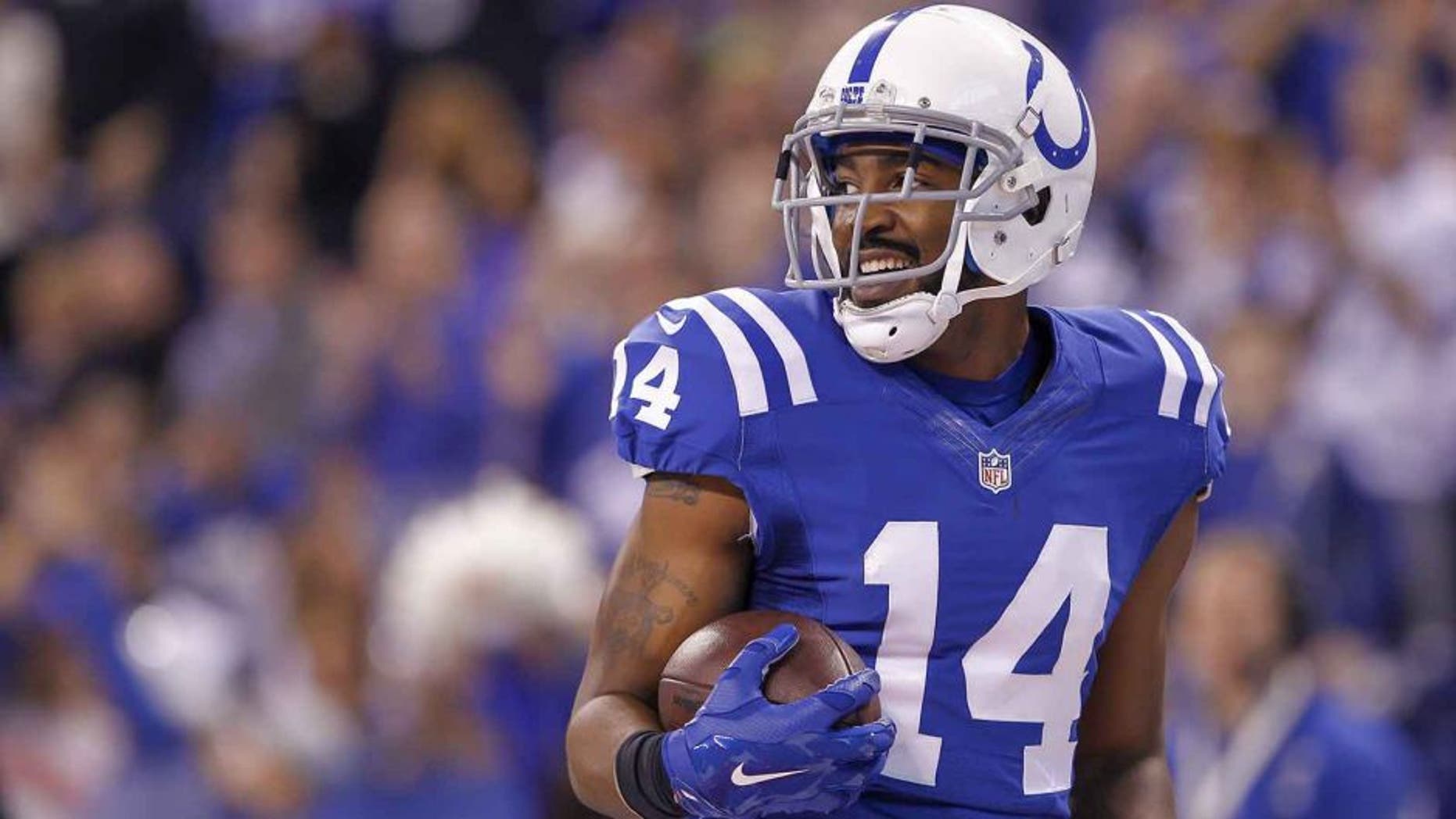 INDIANAPOLIS, IN - DECEMBER 14: Hakeem Nicks #14 of the Indianapolis Colts runs the ball against the Houston Texans at Lucas Oil Stadium on December 14, 2014 in Indianapolis, Indiana. (Photo by Michael Hickey/Getty Images)