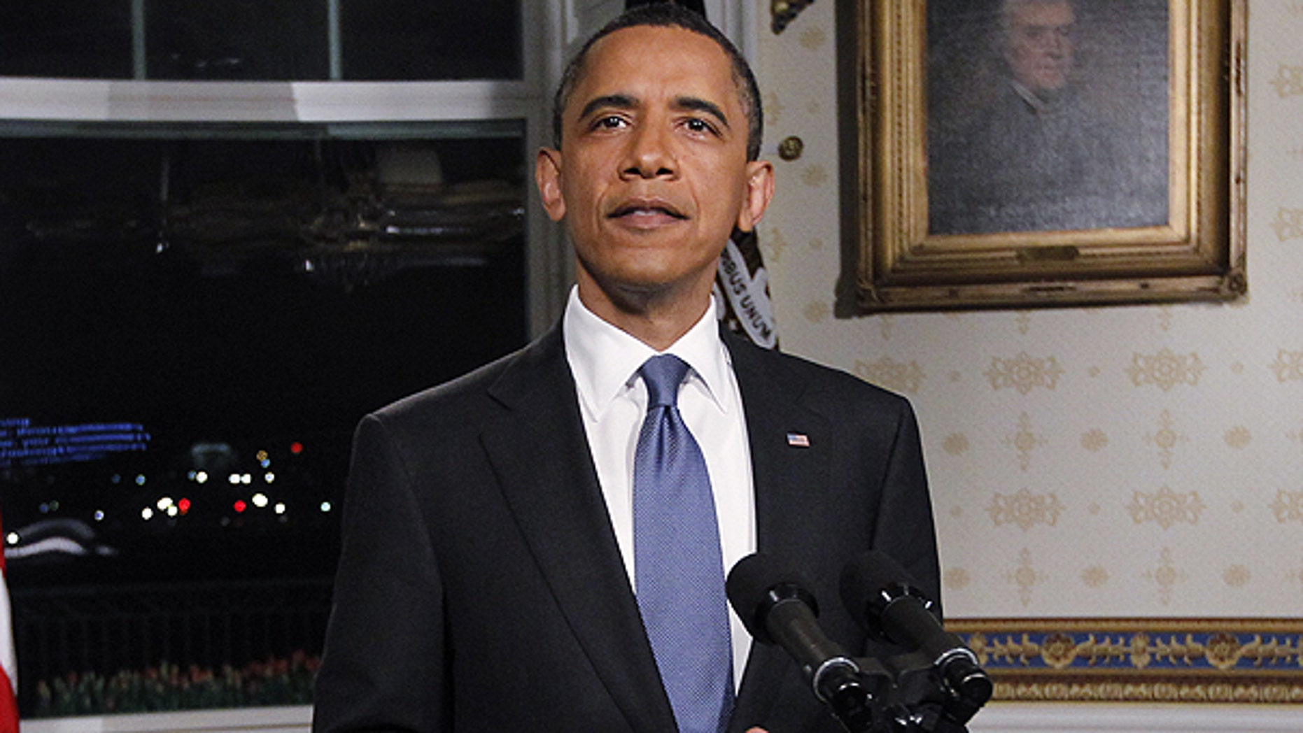 April 8: President Obama poses for photographers in the Blue Room at the White House in Washington after he spoke regarding the budget and averted government shutdown after a deal was made between Republican and Democrat lawmakers.