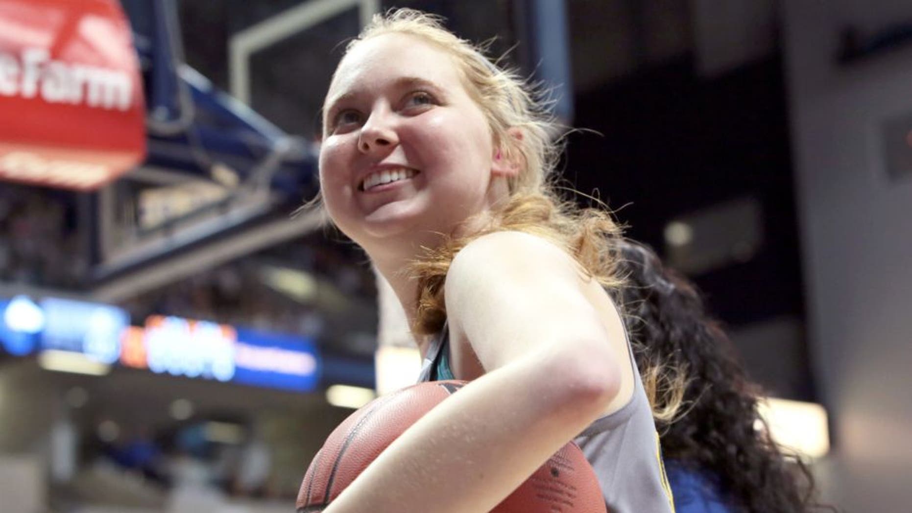 CINCINNATI - NOVEMBER 2: Freshman Lauren Hill of Mount St. Joseph smiles during a game at Xavier University in Cincinnati Ohio at the Cintas Center. NOTE TO USER: User expressly acknowledges and agrees that, by downloading and or using this Photograph, user is consenting to the terms and condition of the Getty Images License Agreement. Mandatory Copyright Notice: 2014 NBAE (Photo by Ron Hoskins/NBAE via Getty Images)