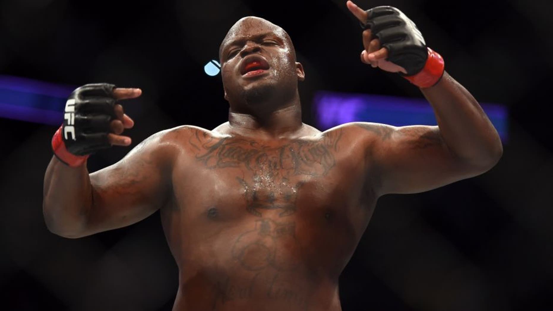 HOUSTON, TX - OCTOBER 03: Derrick Lewis celebrates after defeating Viktor Pesta by TKO in their heavyweight bout during the UFC 192 event at the Toyota Center on October 3, 2015 in Houston, Texas. (Photo by Jeff Bottari/Zuffa LLC/Zuffa LLC via Getty Images)