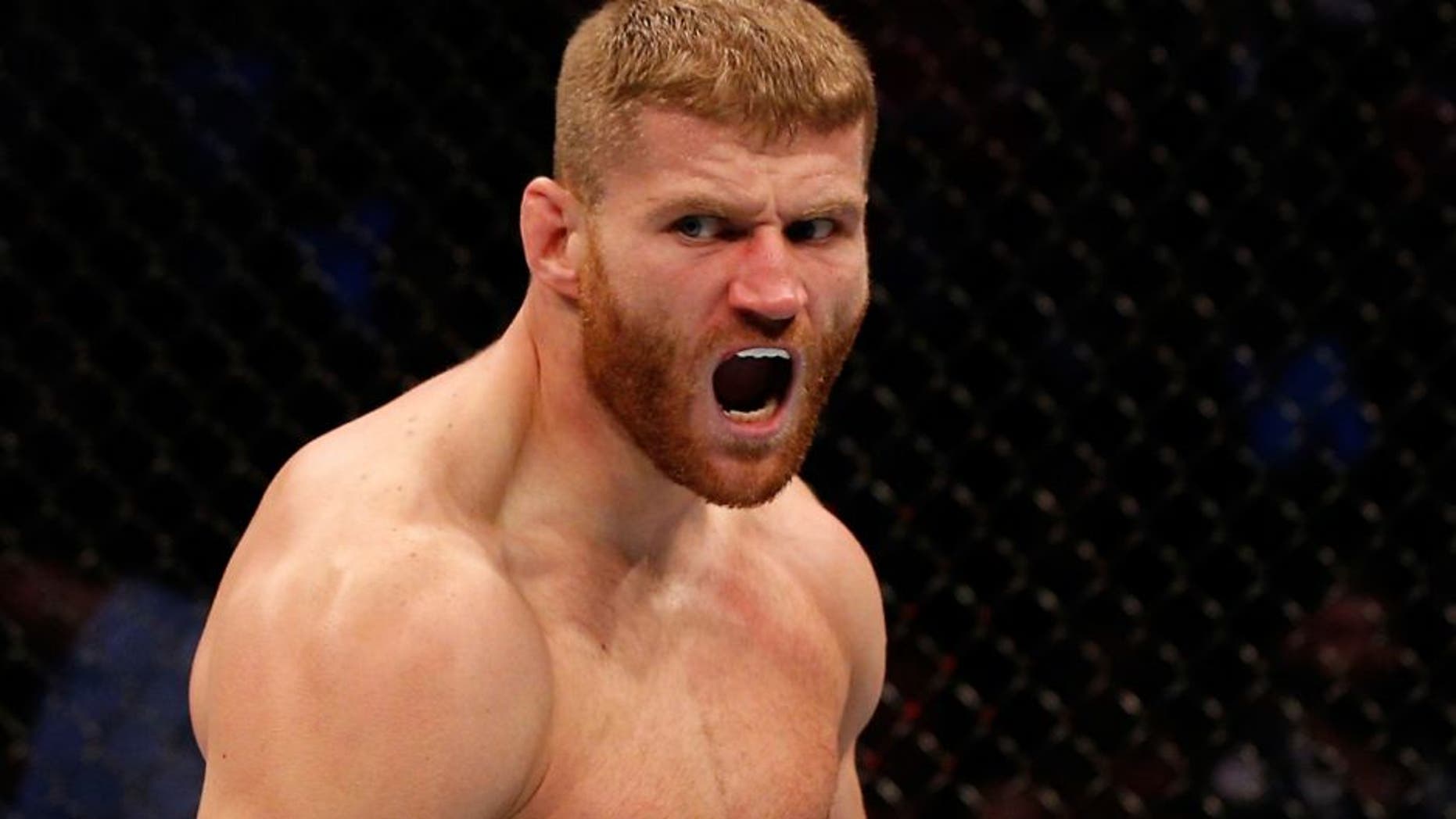 > in their light heavyweight bout at the Ericsson Globe Arena on October 4, 2014 in Stockholm, Sweden.