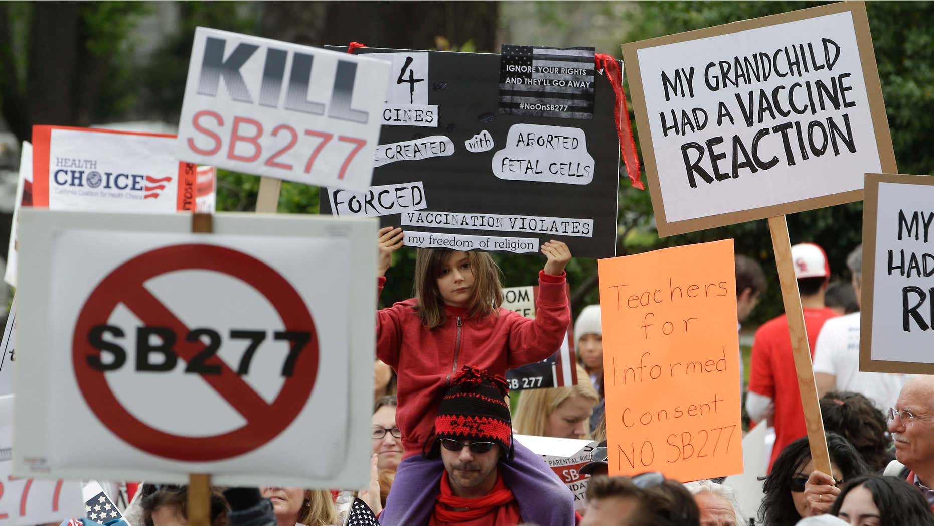 April 8, 2015: Protesters rally against a measure requiring California schoolchildren to get vaccinated at the Capitol in Sacramento, Calif.