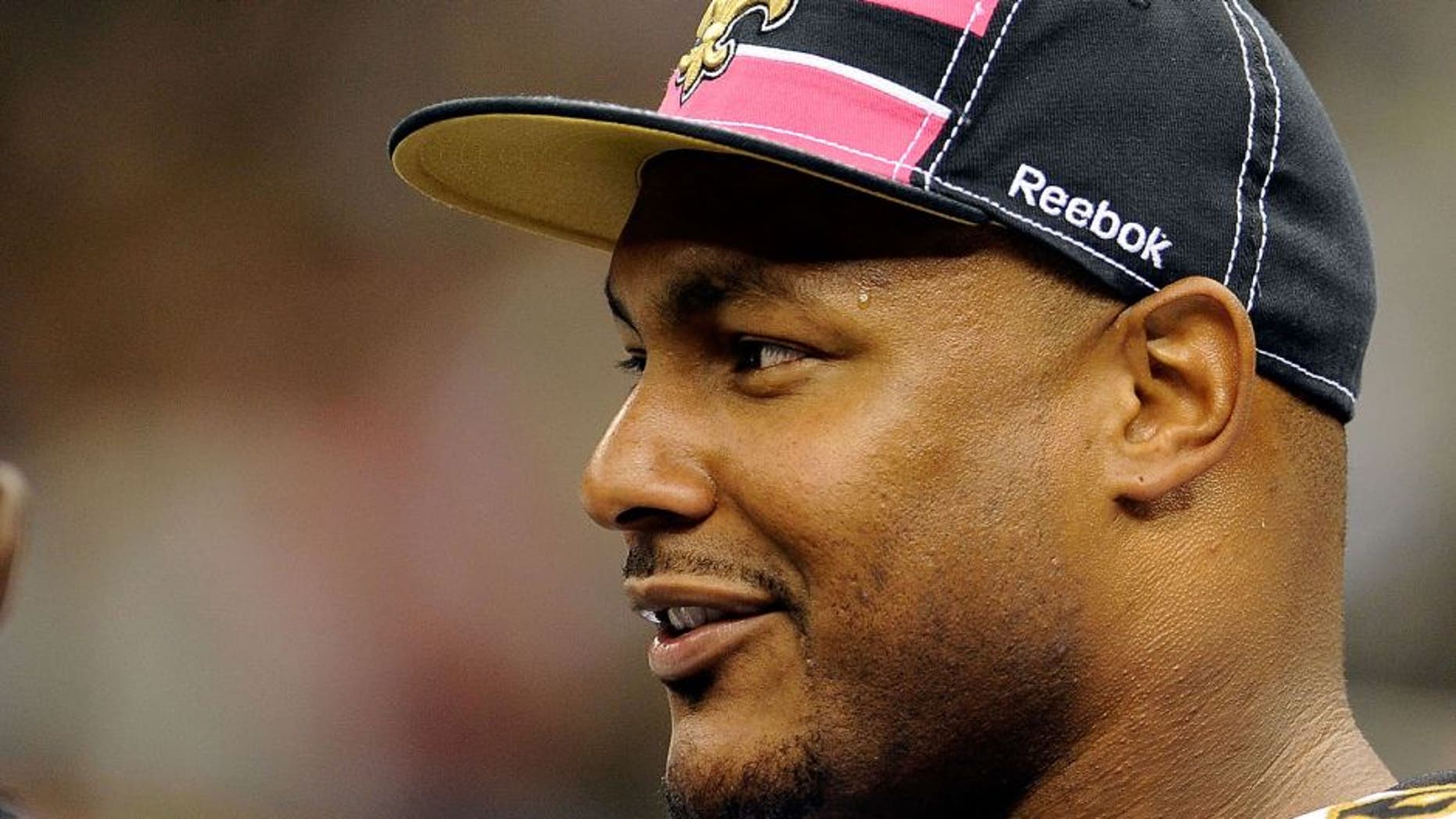 NEW ORLEANS, LA - OCTOBER 23: Will Smith #91 of the New Orleans Saints stands on the sideline during a game against the Indianapolis Colts being held at Mercedes-Benz Superdome on October 23, 2011 in New Orleans, Louisiana. The Saints defeated the Colts 62-7. (Photo by Stacy Revere/Getty Images)
