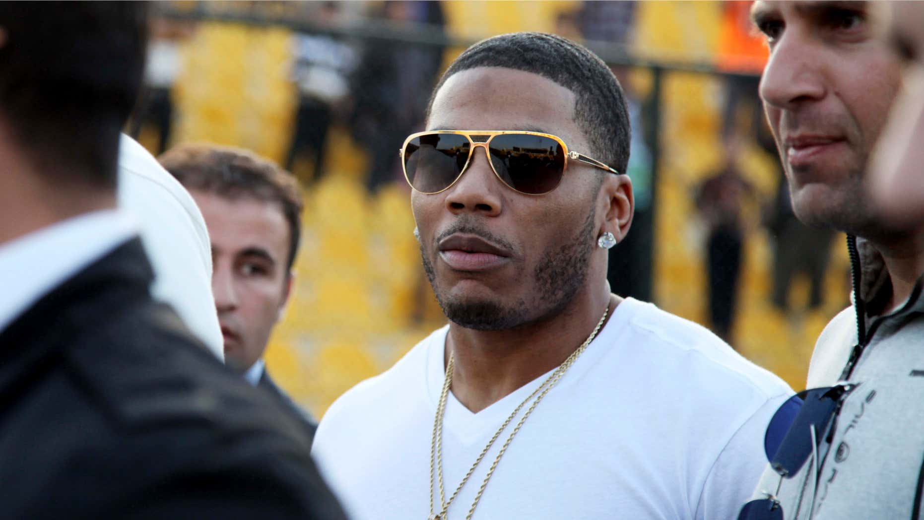 March 13, 2015: U.S. rapper Nelly approaches the stage for a concert in Irbil, northern Iraq.