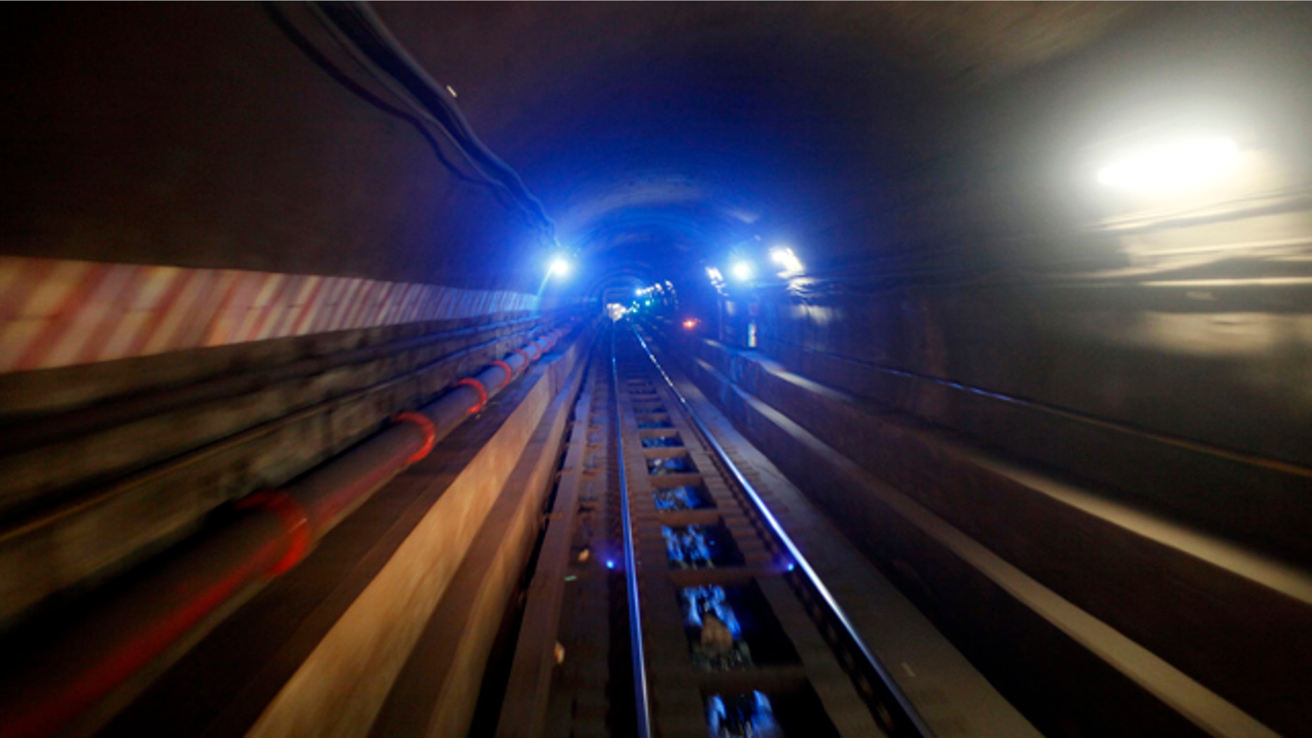 In this April 1, 2010 photo, the tunnel connecting the Bowling Green station in Manhattan to the Borough Hall station in Brooklyn on the 4 train line is seen in New York. (AP Photo/Mary Altaffer)