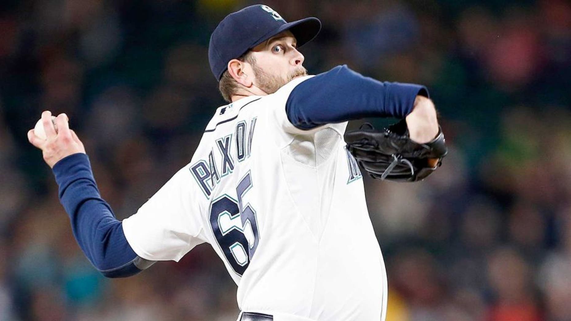 Apr 7, 2015; Seattle, WA, USA; Seattle Mariners pitcher James Paxton (65) throws against the Los Angeles Angels during the fifth inning at Safeco Field. Mandatory Credit: Joe Nicholson-USA TODAY Sports
