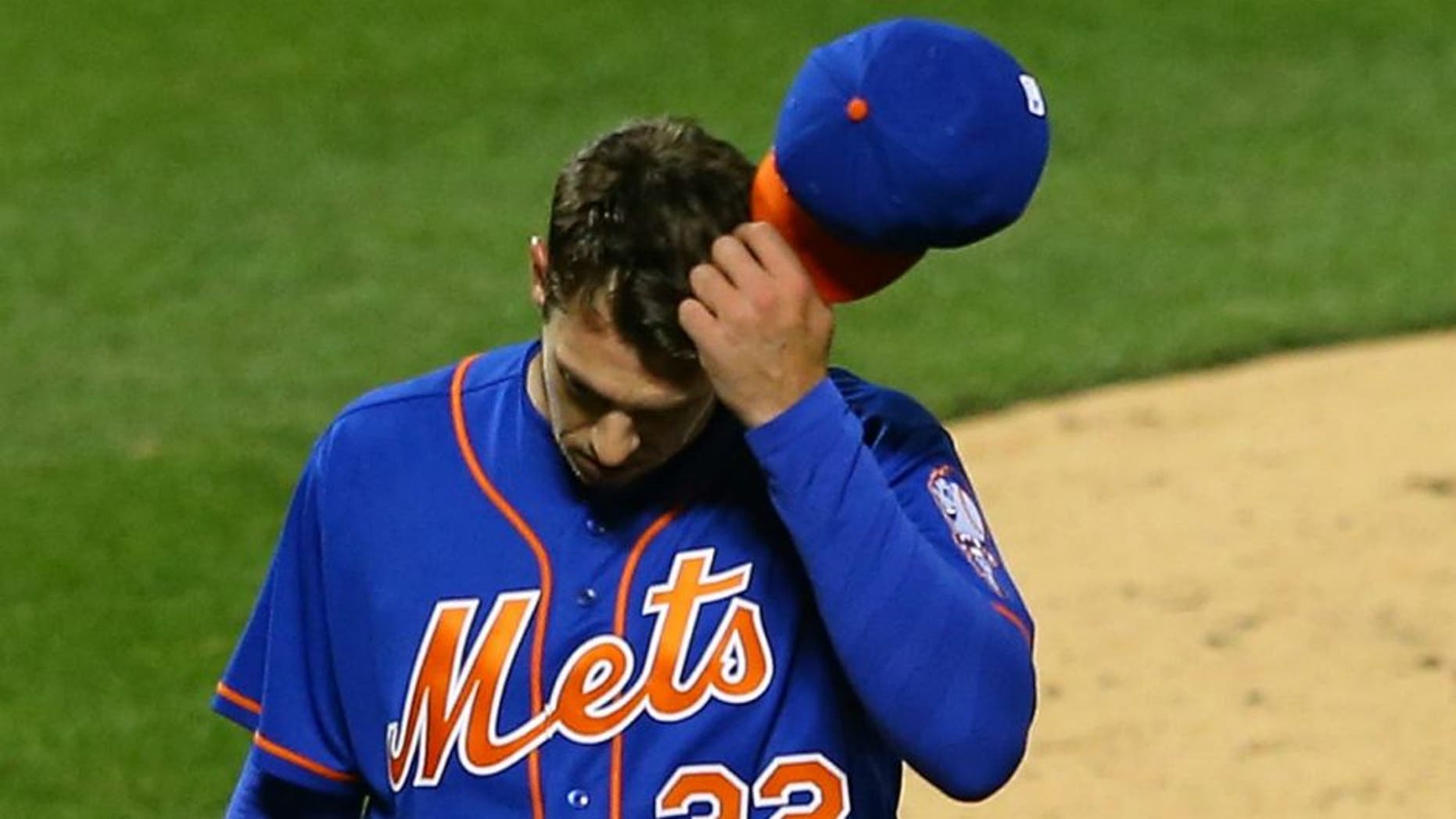 NEW YORK, NEW YORK - APRIL 11: Steven Matz #32 of the New York Mets walks off the mound after giving up 7-runs in the second inning against the Miami Marlins at Citi Field on April 11, 2016 in the Flushing neighborhood of the Queens borough of New York City. (Photo by Mike Stobe/Getty Images)