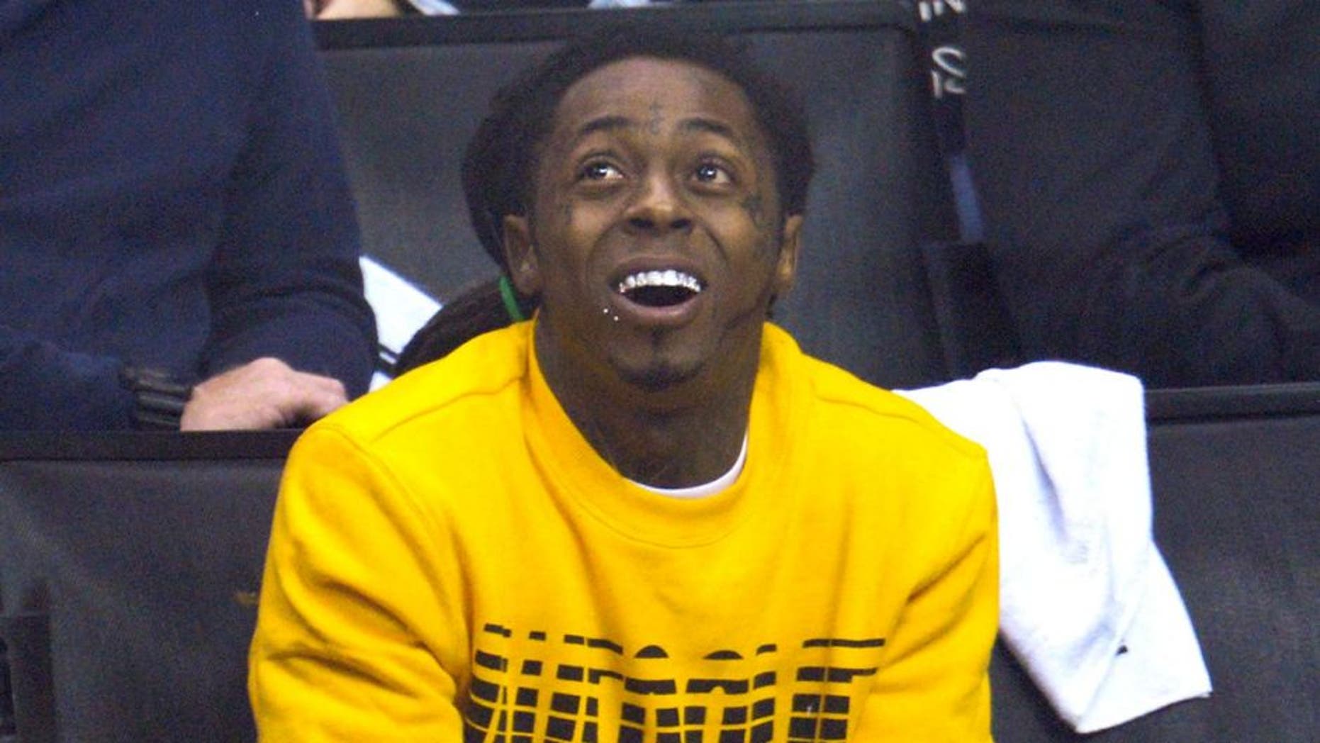 LOS ANGELES, CA - JUNE 06: Lil Wayne attends an NHL playoff game between the Chicago Blackhawks and the Los Angeles Kings at Staples Center on June 6, 2013 in Los Angeles, California. (Photo by Noel Vasquez/Getty Images)
