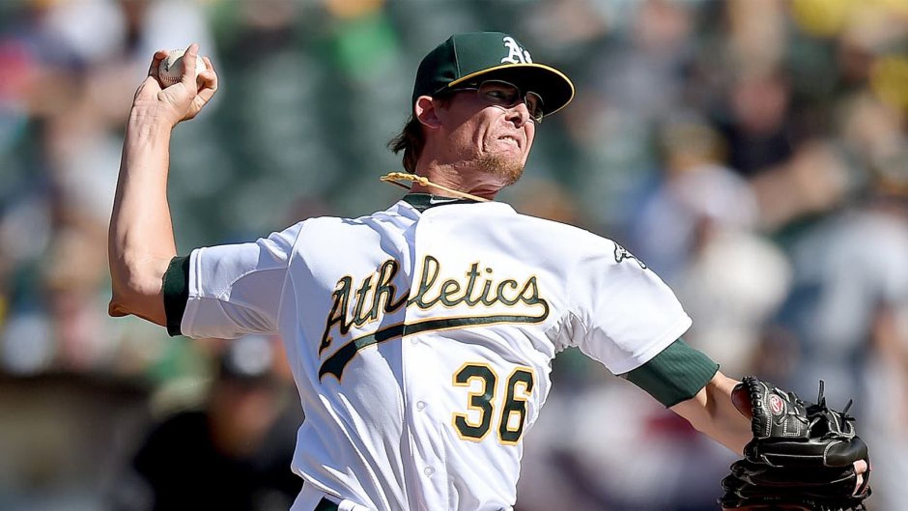 OAKLAND, CA - APRIL 12: Tyler Clippard #36 of the Oakland Athletics pitches against the Seattle Mariners in the top of the tenth inning at O.co Coliseum on April 12, 2015 in Oakland, California. (Photo by Thearon W. Henderson/Getty Images)