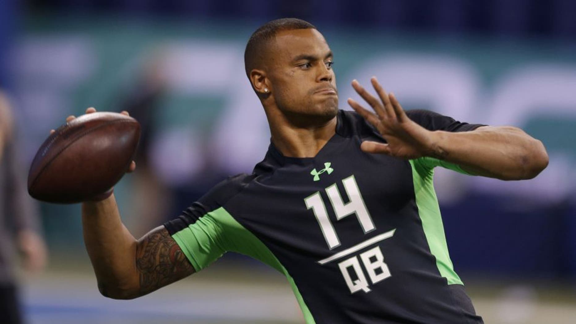 Mississippi State Bulldogs quarterback Dak Prescott throws a pass during the 2016 NFL Scouting Combine at Lucas Oil Stadium. Mandatory Credit: Brian Spurlock-USA TODAY Sports