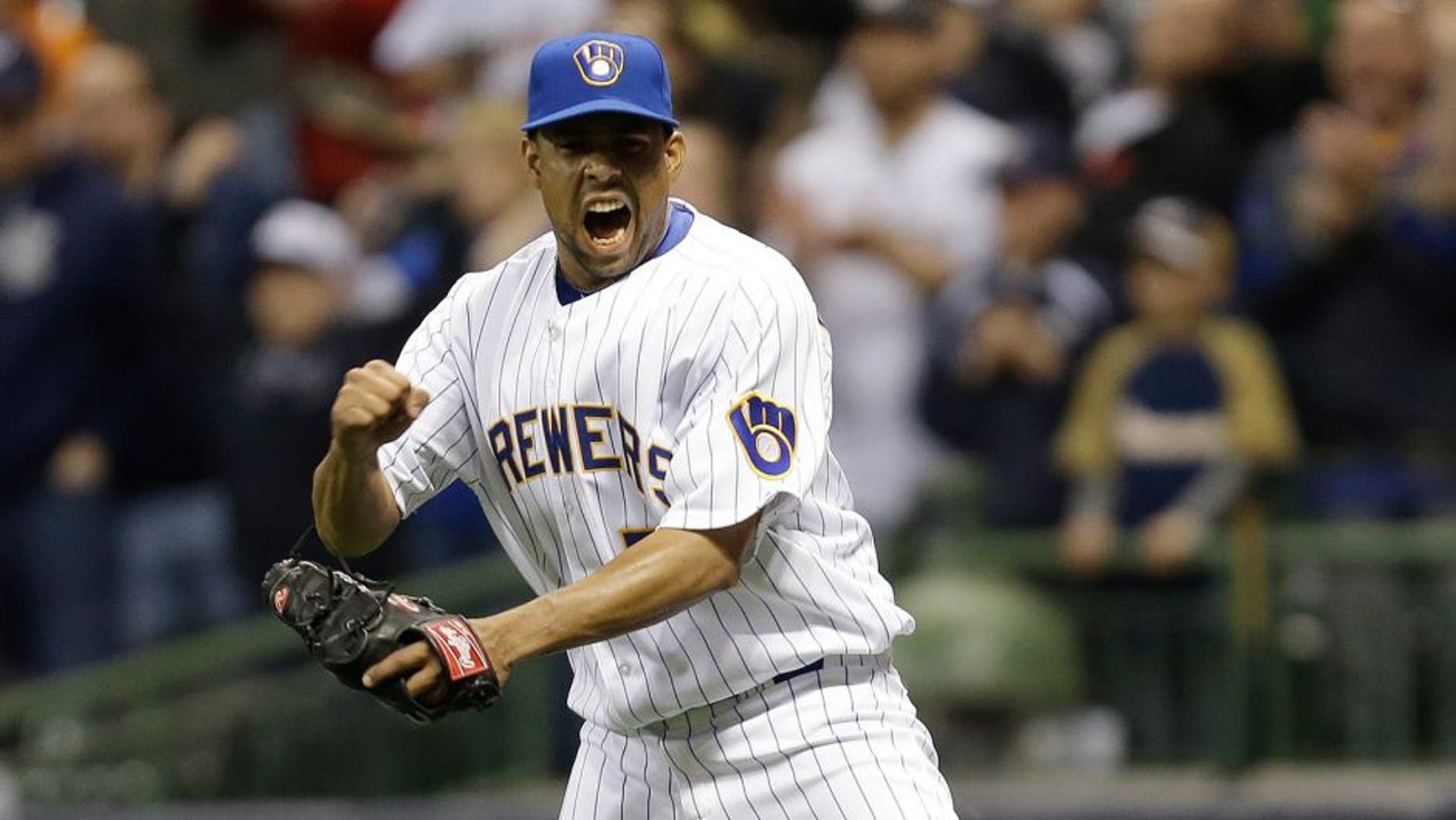 MILWAUKEE, WI - APRIL 12: Francisco Rodriguez #57 of the Milwaukee Brewers celebrates after the 3-2 win over the Pittsburgh Pirates at Miller Park on April 12, 2014 in Milwaukee, Wisconsin. (Photo by Mike McGinnis/Getty Images)