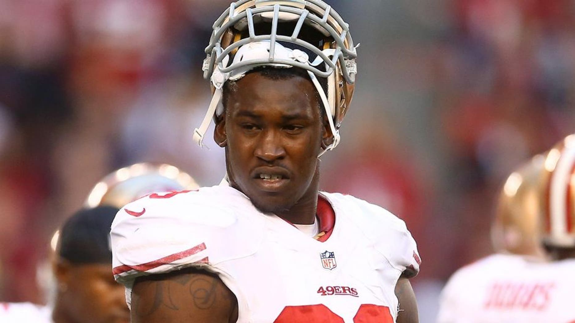 Dec 29, 2013; Phoenix, AZ, USA; San Francisco 49ers linebacker Aldon Smith (99) against the Arizona Cardinals at University of Phoenix Stadium. Mandatory Credit: Mark J. Rebilas-USA TODAY Sports