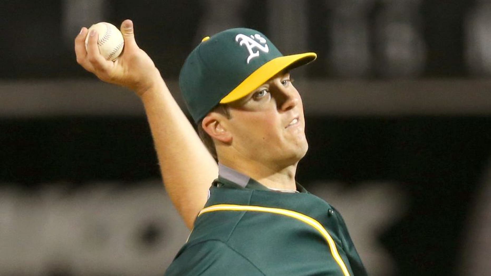 Apr 10, 2015; Oakland, CA, USA; Oakland Athletics starting pitcher Drew Pomeranz (13) pitches the ball against the Seattle Mariners during the third inning at O.co Coliseum. Mandatory Credit: Kelley L Cox-USA TODAY Sports