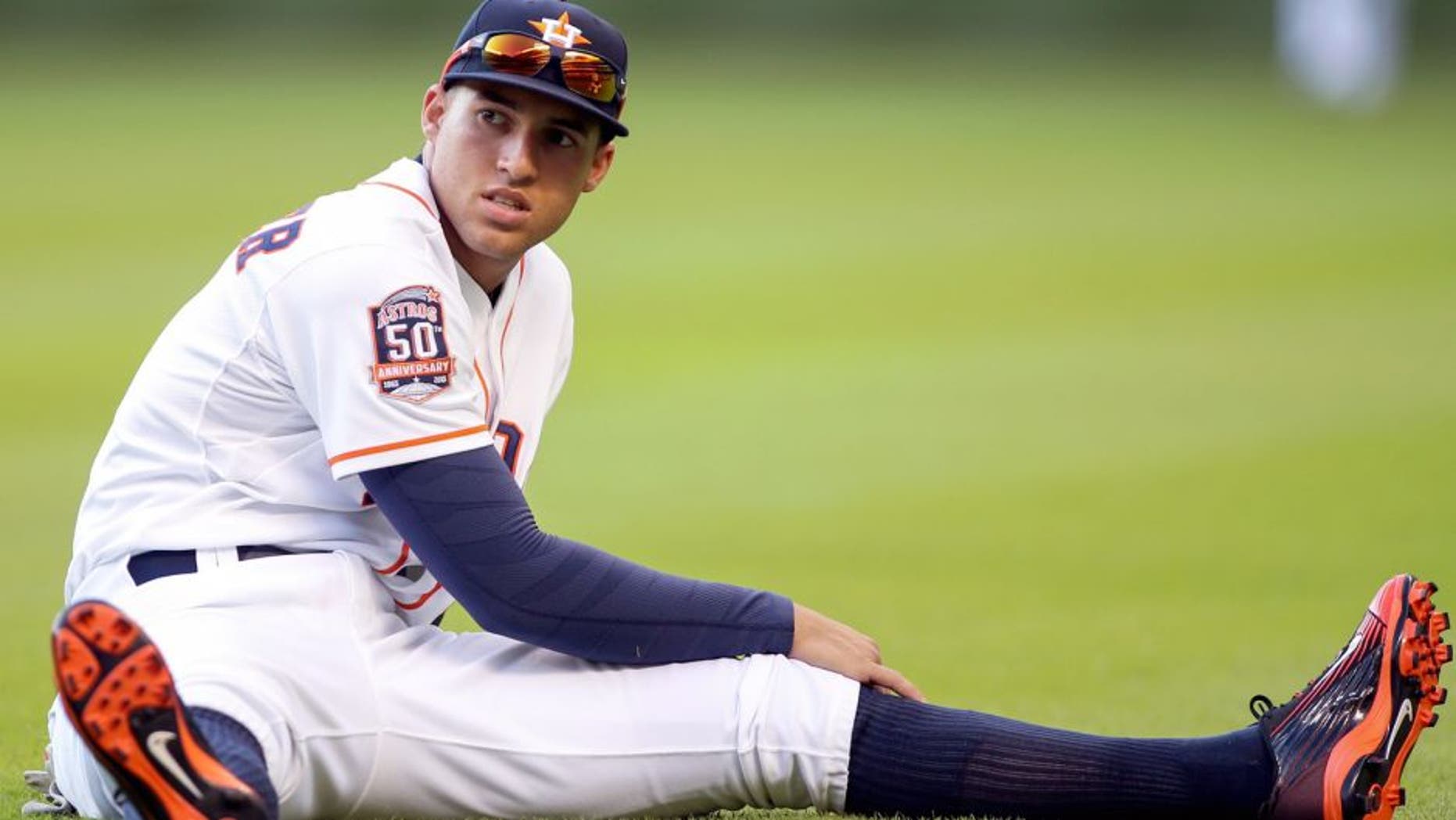 Apr 13, 2015; Houston, TX, USA; Houston Astros right fielder George Springer (4) warms up before a game against the Oakland Athletics at Minute Maid Park. Mandatory Credit: Troy Taormina-USA TODAY Sports
