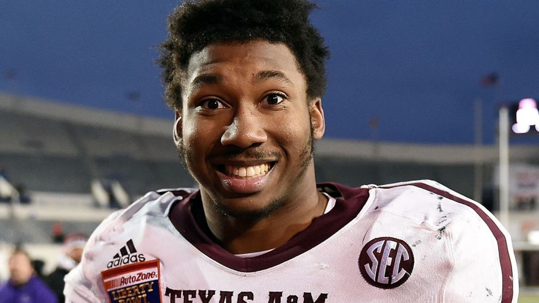 MEMPHIS, TN - DECEMBER 29: Myles Garrett #15 of the Texas A&M Aggies leaves the field following a victory over the West Virginia Mountaineers in the 56th annual Autozone Liberty Bowl at Liberty Bowl Memorial Stadium on December 29, 2014 in Memphis, Tennessee. Texas A&M won the game 45-37. (Photo by Stacy Revere/Getty Images)