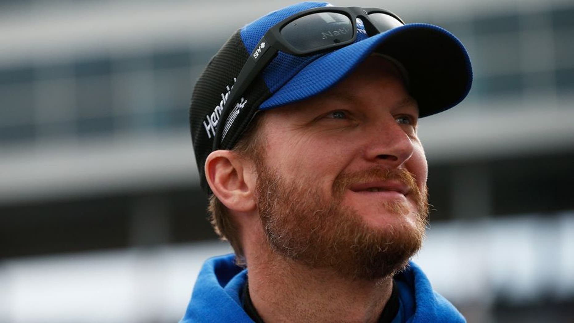 FORT WORTH, TEXAS - APRIL 09: Dale Earnhardt Jr., driver of the #88 Nationwide Chevrolet, stands on the grid prior to the NASCAR Sprint Cup Series Duck Commander 500 at Texas Motor Speedway on April 9, 2016 in Fort Worth, Texas. (Photo by Brian Lawdermilk/Getty Images)
