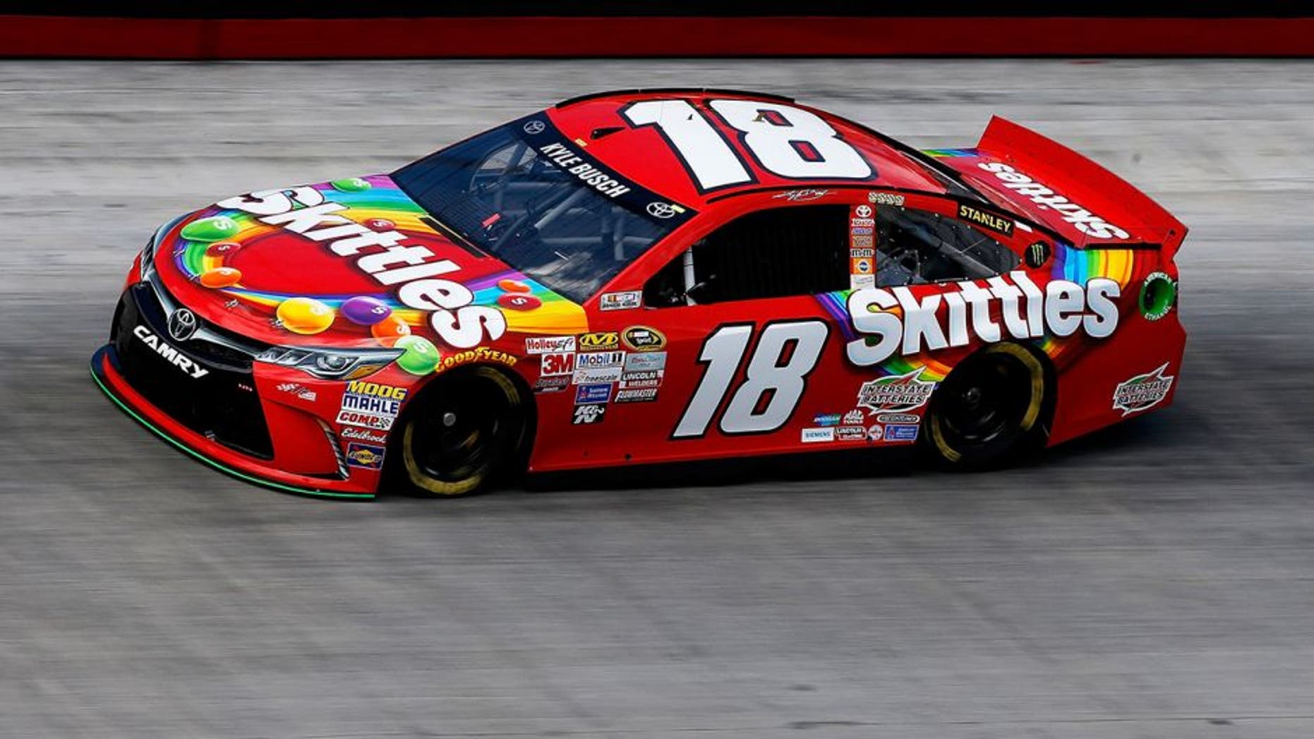 BRISTOL, TN - AUGUST 21: Kyle Busch, driver of the #18 Skittles Toyota, practices for the NASCAR Sprint Cup Series Irwin Tools Night Race at Bristol Motor Speedway on August 21, 2015 in Bristol, Tennessee. (Photo by Gregory Shamus/Getty Images)