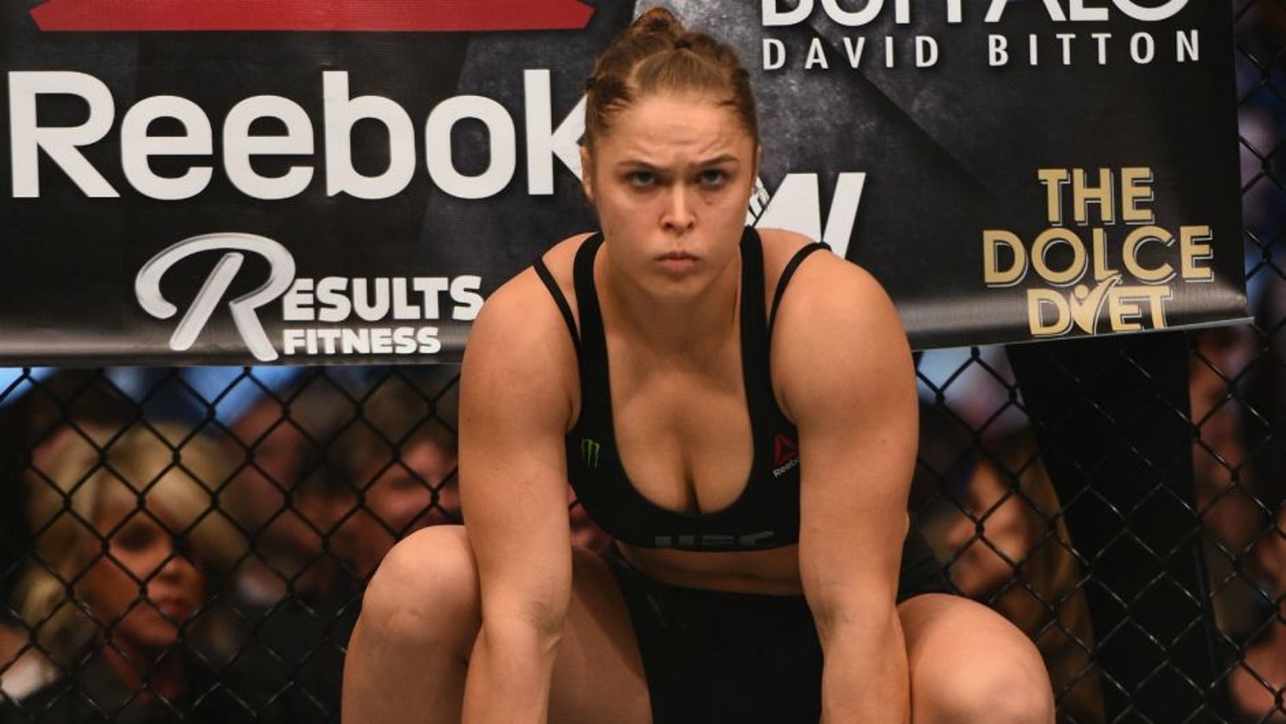 > in their UFC women's bantamweight championship bout during the UFC 184 event at Staples Center on February 28, 2015 in Los Angeles, California.