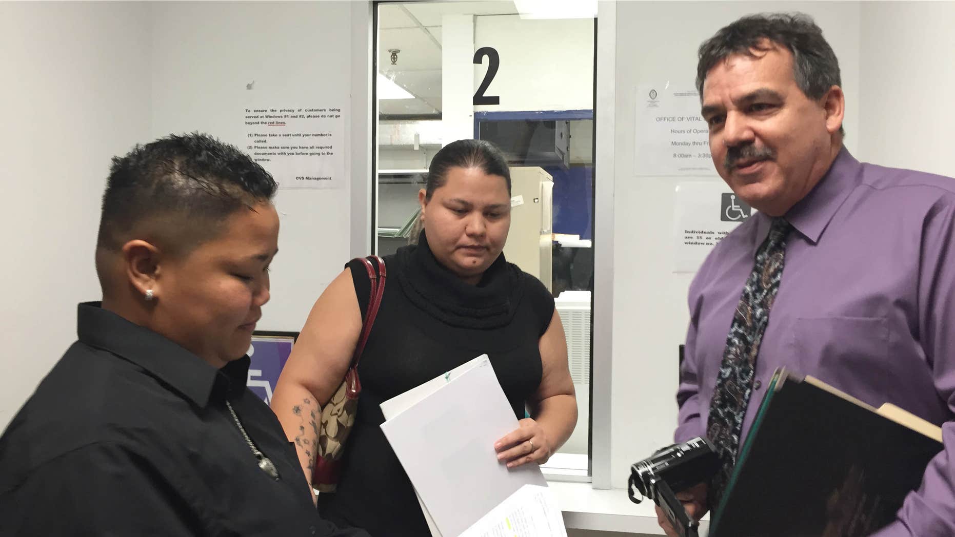 April 8, 2015: Same-sex couple Loretta M. Pangelinan, left, and Kathleen M. Aguero, both 28, react after they were turned away while attempting to apply for a marriage license at the Guam Department of Public Health and Social Services Office of Vital Statistics.