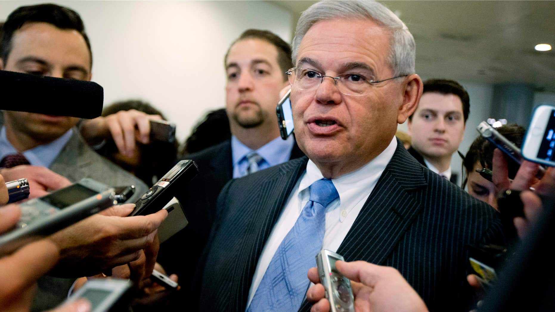 April 14, 2015: In this file photo, Sen. Robert Menendez, D-N.J. speaks with members of the media on Capitol Hill in Washington.