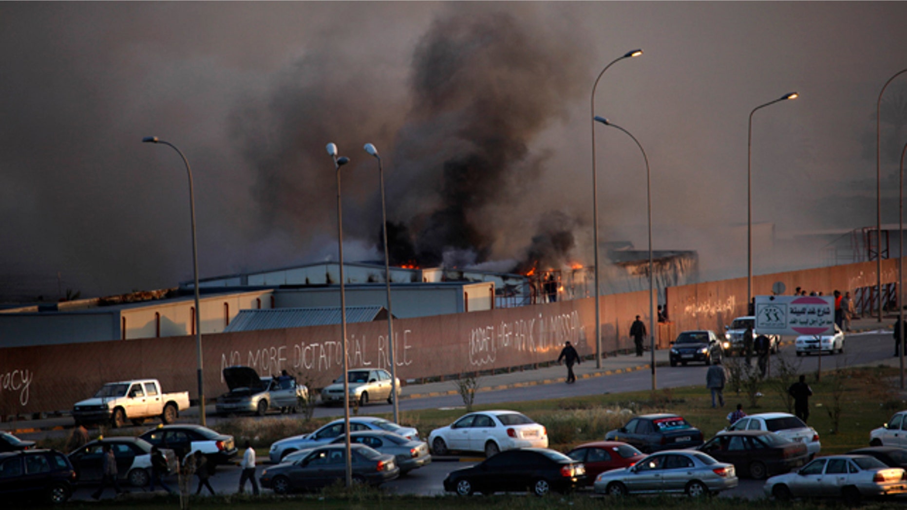 April 15: Fire and smoke rises from storage warehouse at a construction site that is run by a foreign company, with no clear causes of the incident, in Benghazi, Libya.