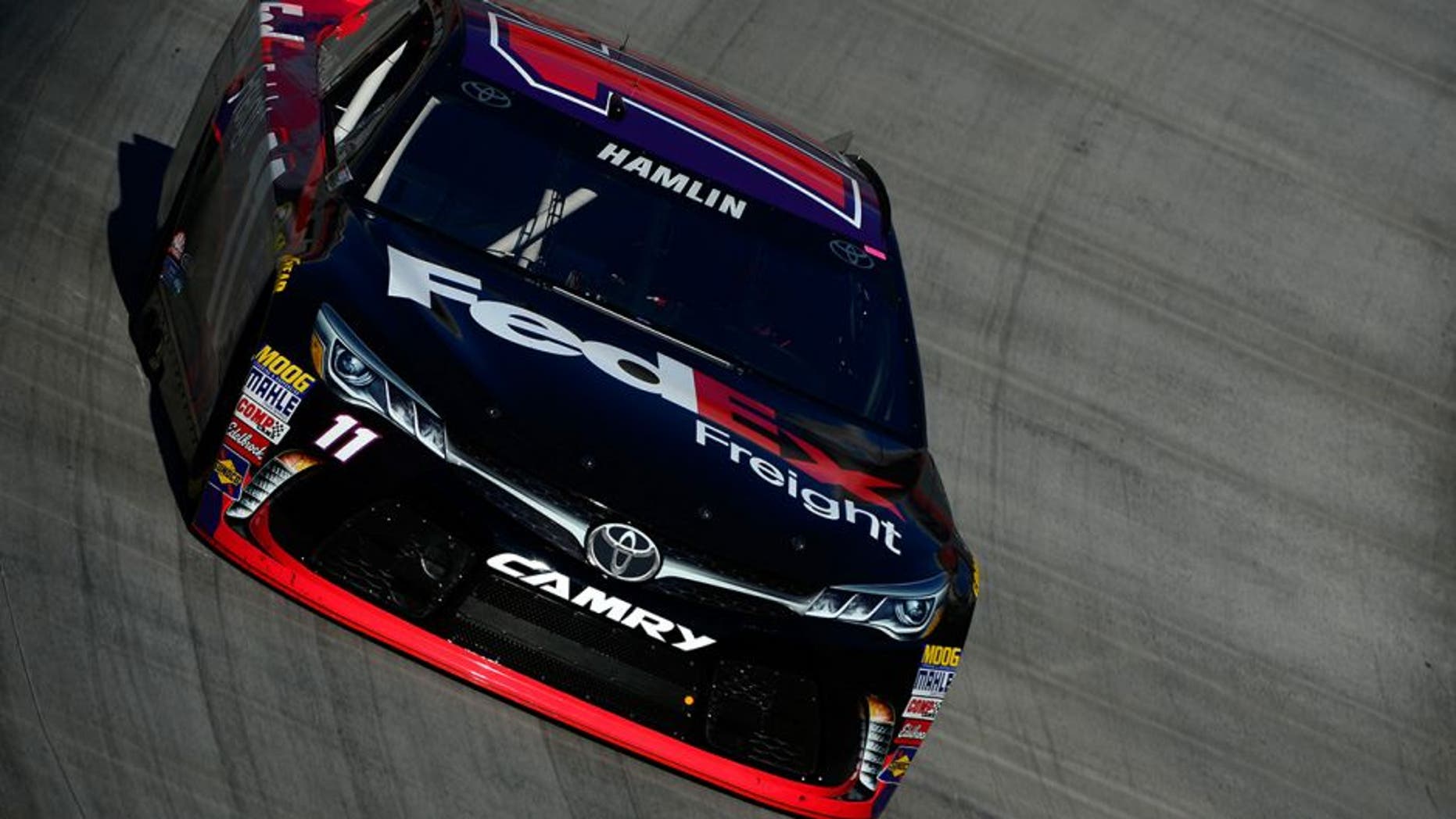 BRISTOL, TN - APRIL 16: Denny Hamlin, driver of the #11 FedEx Freight Toyota, practices for the NASCAR Sprint Cup Series Food City 500 at Bristol Motor Speedway on April 16, 2016 in Bristol, Tennessee. (Photo by Robert Laberge/Getty Images)