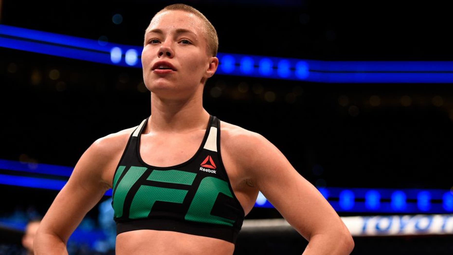 TAMPA, FL - APRIL 16: Rose Namajunas celebrates her victory over Tecia Torreshug after their women's strawweight bout during the UFC Fight Night event at Amalie Arena on April 16, 2016 in Tampa, Florida. (Photo by Jeff Bottari/Zuffa LLC/Zuffa LLC via Getty Images)