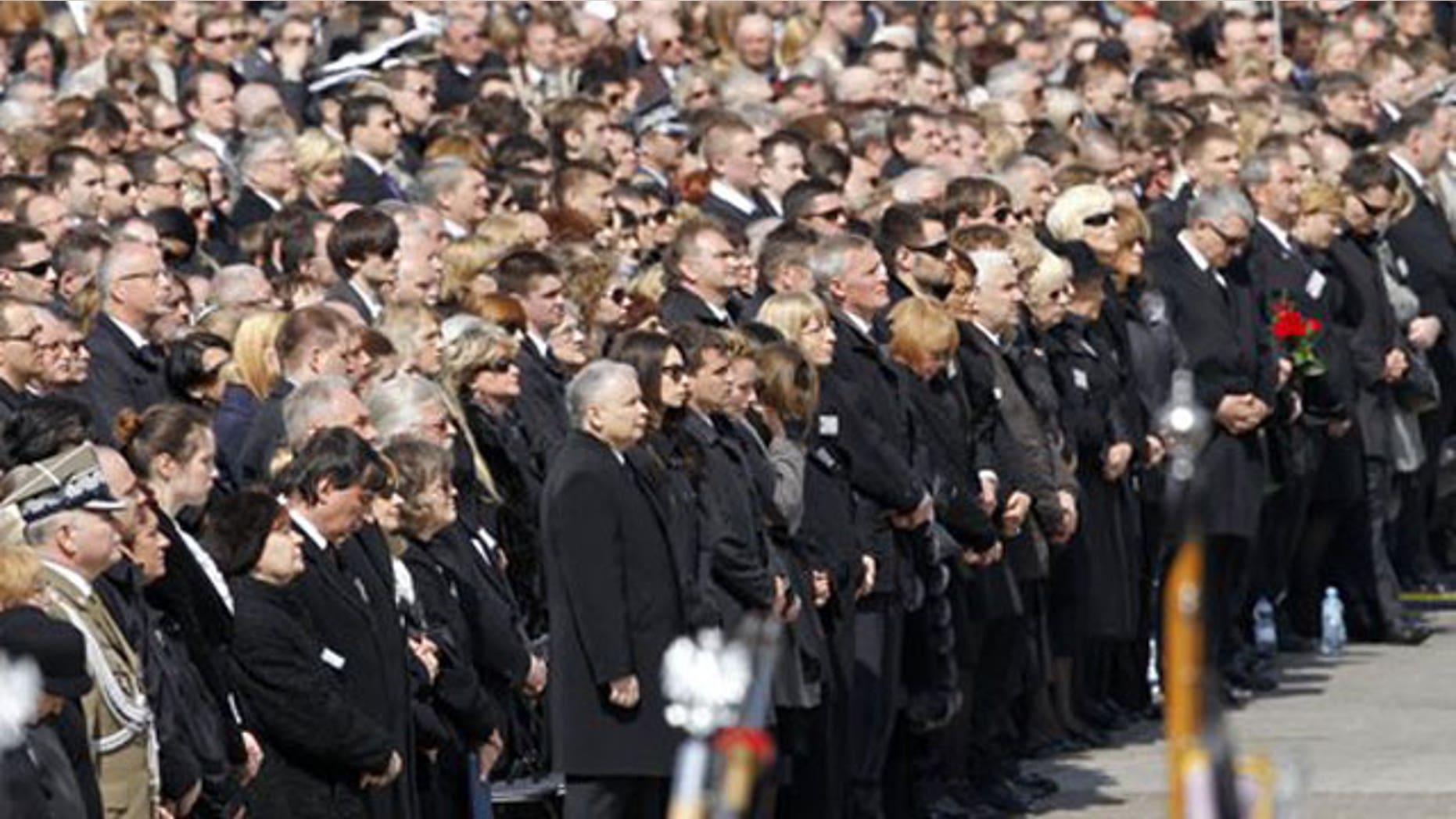April 17: Former Polish Prime Minister Jaroslaw Kaczynski, center, brother of late President Kaczynski, and Marta Kaczynska, right of him, only daughter of the Presidential couple, attend a national memorial service in Pilsudski Square in Warsaw.