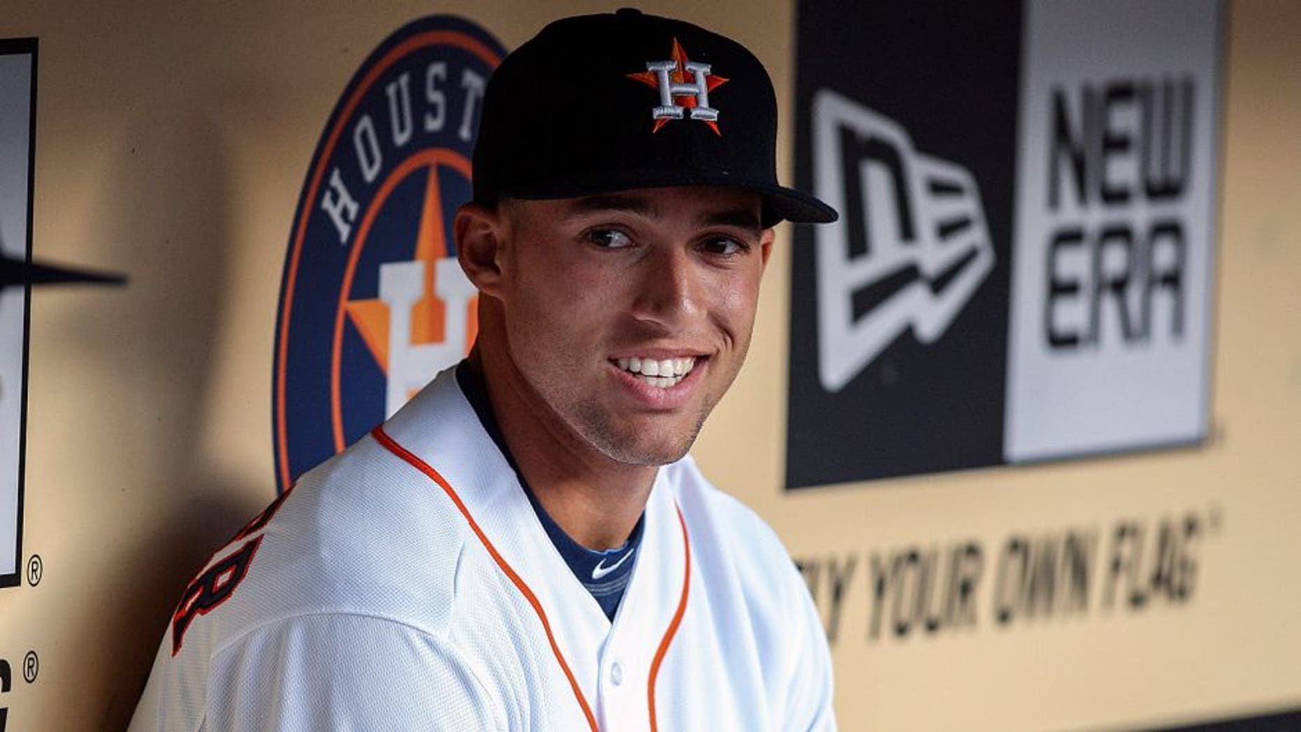 Apr 16, 2014; Houston, TX, USA; Houston Astros right fielder George Springer (4) sits in the dugout before a game against the Kansas City Royals at Minute Maid Park. Mandatory Credit: Troy Taormina-USA TODAY Sports