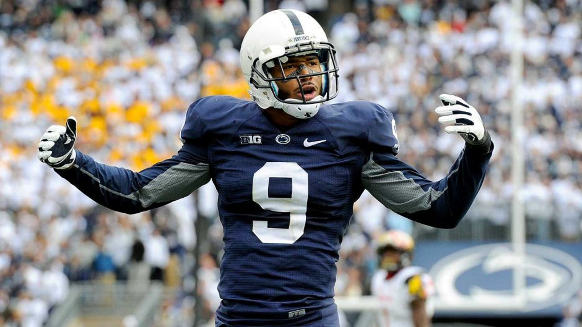 Nov 1, 2014; University Park, PA, USA; Penn State Nittany Lions cornerback Jordan Lucas (9) gestures to the crowd against the Maryland Terrapins during the fourth quarter at Beaver Stadium. Maryland defeated Penn State 20-19. Mandatory Credit: Rich Barnes-USA TODAY Sports