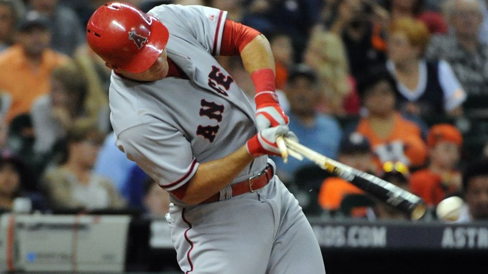 Los Angeles Angels outfielder Mike Trout grounds out in the third inning of a baseball game against the Houston Astros, Saturday, April 18, 2015, at Minute Maid Park in Houston. (AP Photo/Eric Christian Smith)