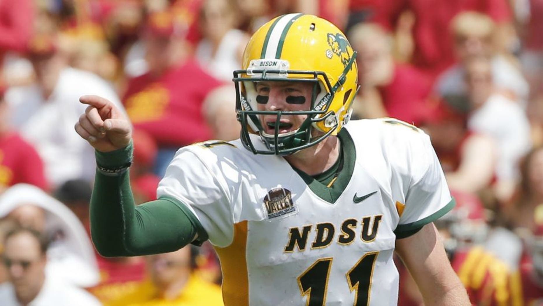 AMES, IA - AUGUST 30: Quarterback Carson Wentz #11 of the North Dakota State Bison calls a play in the second half of play against the Iowa State Cyclones at Jack Trice Stadium on August 30, 2014 in Ames, Iowa. North Dakota State defeated Iowa State 34-14. (Photo by David K Purdy/Getty Images)