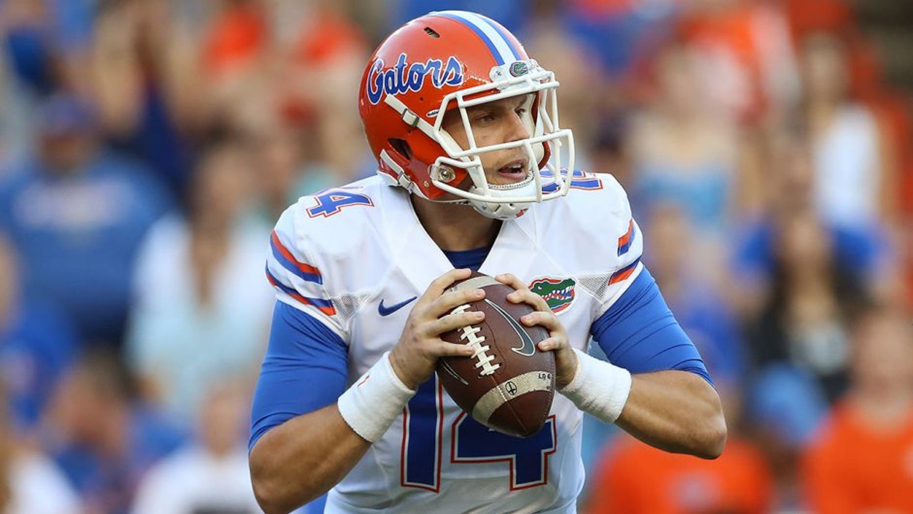 Apr 8, 2016; Gainesville, FL, USA; Florida Gators quarterback Luke Del Rio (14) looks to pass in the first quarter of the Orange and Blue at Ben Hill Griffin Stadium. Mandatory Credit: Logan Bowles-USA TODAY Sports