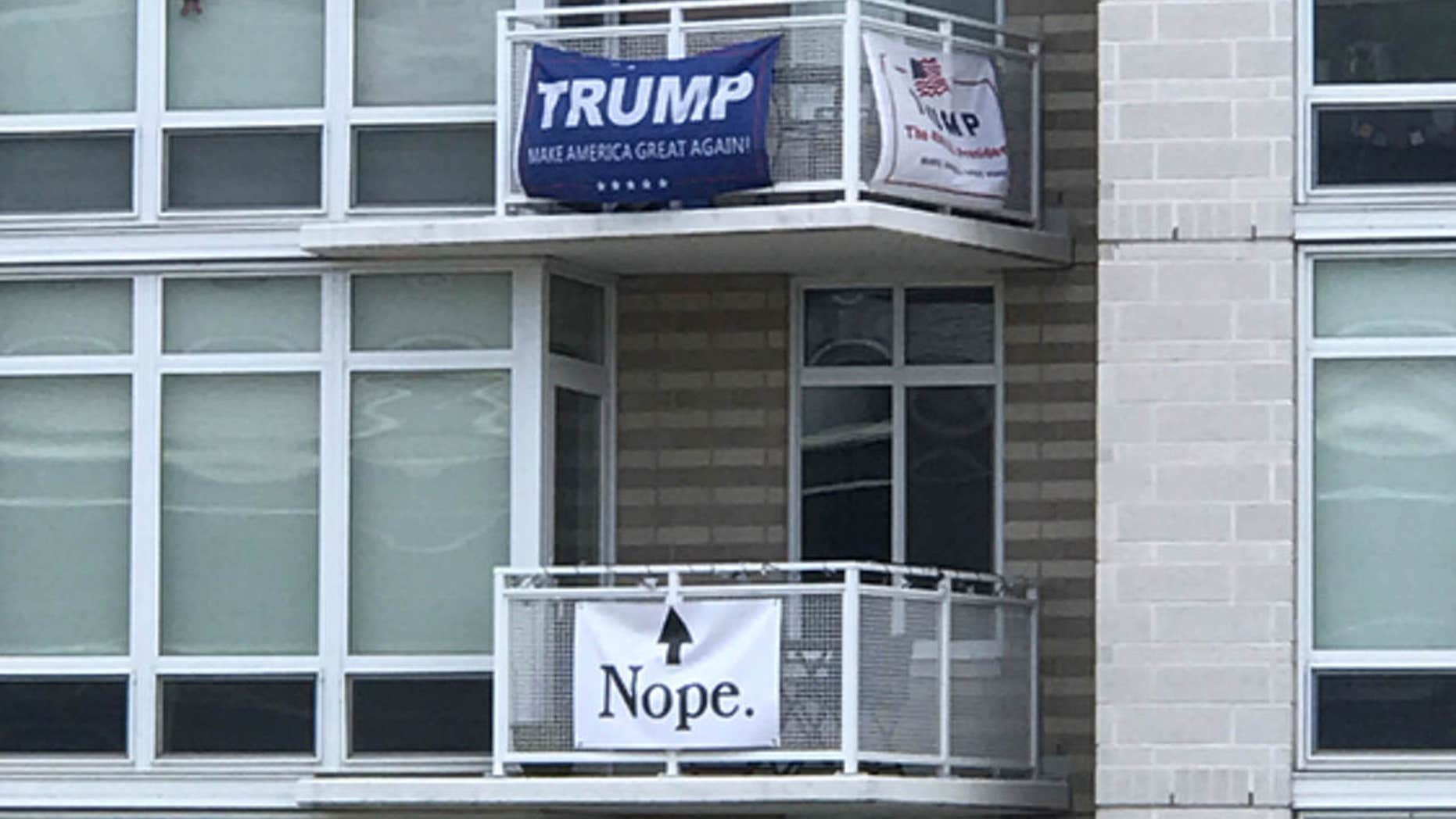 A political rivalry between neighbors at a Southwest D.C. apartment building caught the attention of Washington Nationals fans over the weekend.
