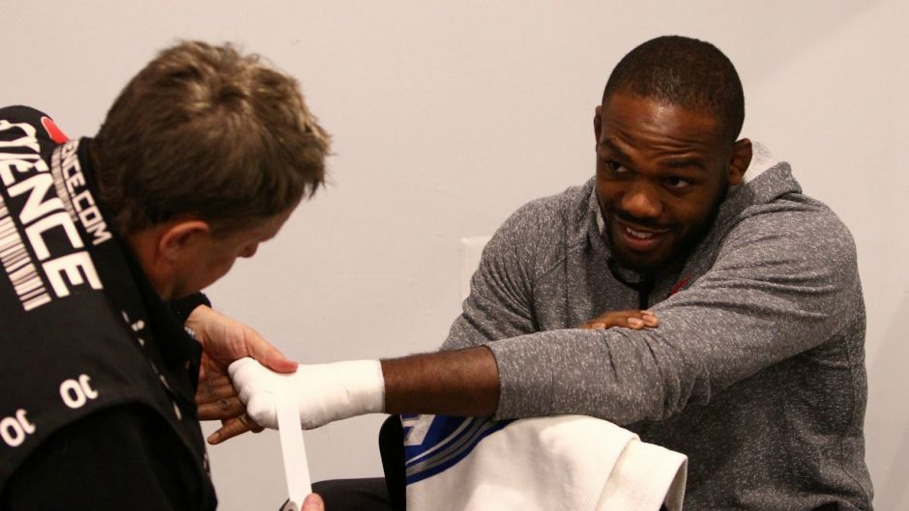 BALTIMORE, MD - APRIL 26: Jon "Bones" Jones has his hands wrapped before his light heavyweight championship bout against Glover Teixeira during the UFC 172 event at the Baltimore Arena on April 26, 2014 in Baltimore, Maryland. (Photo by Mike Roach/Zuffa LLC/Zuffa LLC via Getty Images) *** Local Caption *** Jon Jones