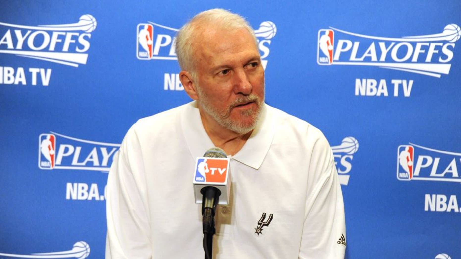 LOS ANGELES, CA - APRIL 19: Head Coach Gregg Popovich of the San Antonio Spurs speaks at a pre-game press conference in Game One of the Western Conference Quarterfinals against the Los Angeles Clippers during the 2015 NBA Playoffs on April 19, 2015 at Staples Center in Los Angeles, California. NOTE TO USER: User expressly acknowledges and agrees that, by downloading and or using this Photograph, user is consenting to the terms and conditions of the Getty Images License Agreement. Mandatory Copyright Notice: Copyright 2015 NBAE (Photo by Andrew D. Bernstein/NBAE via Getty Images)