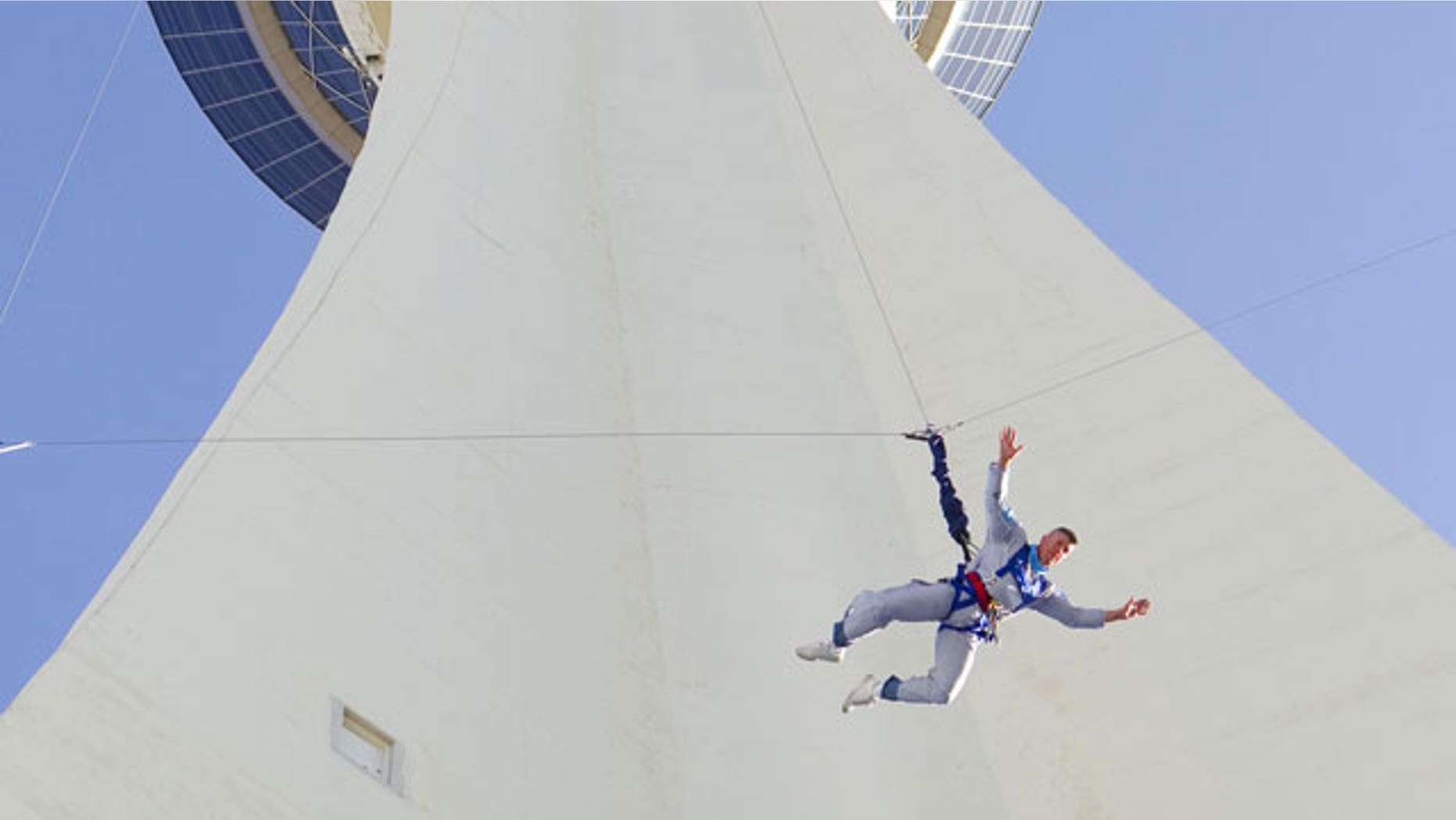 Sr. Master Sgt. Darryl LeBouef jumps from the 108th floor of the Stratosphere Casino, Hotel and Tower in Las Vegas, Nevada, Tuesday, April 20, 2010, during the Grand Opening of SkyJump Las Vegas. LeBouef’s 855-ft leap officially set a Guinness World Record for highest commercial decelerated descent.