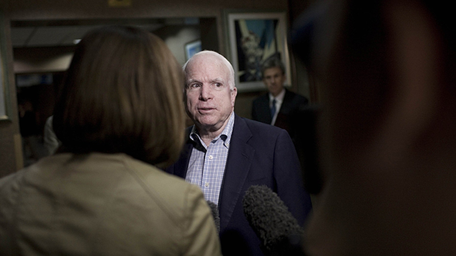 April 22: Sen. John McCain talks with journalists at the Tebisty Hotel in Benghazi, Libya.
