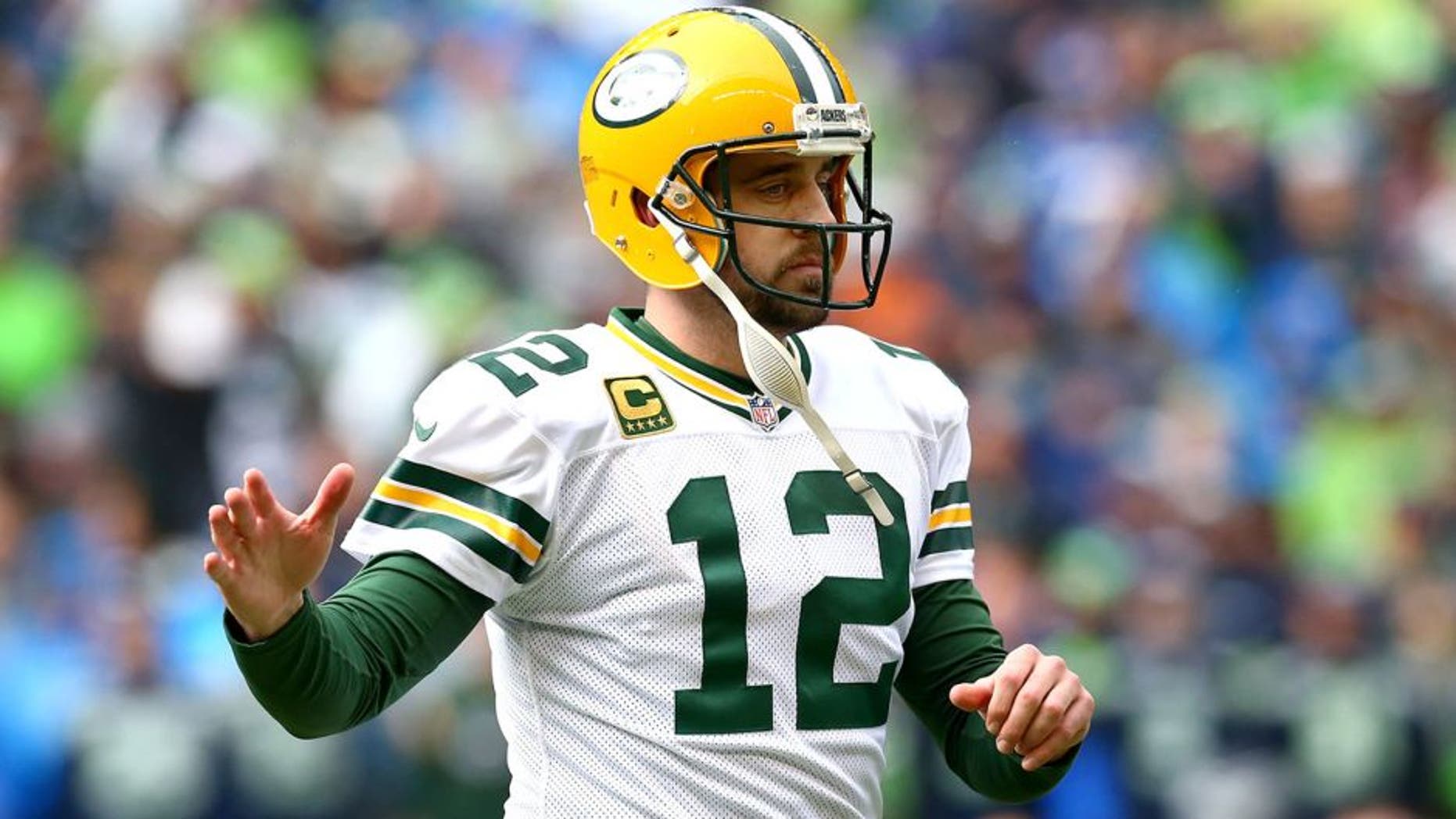 SEATTLE, WA - JANUARY 18: Aaron Rodgers #12 of the Green Bay Packers in action against the Seattle Seahawks during the 2015 NFC Championship game at CenturyLink Field on January 18, 2015 in Seattle, Washington. (Photo by Ronald Martinez/Getty Images)